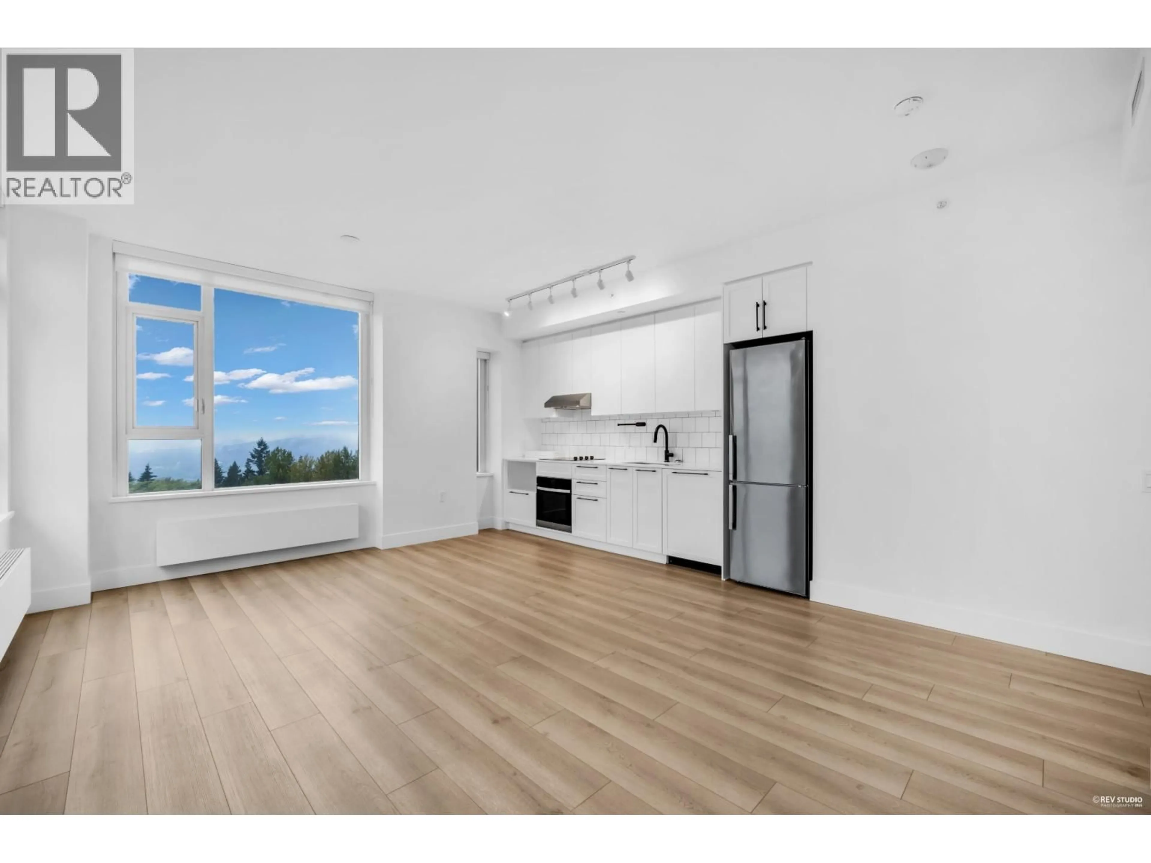 Open concept kitchen, unknown for 802 - 8750 UNIVERSITY CRESCENT, Burnaby British Columbia V5A0G9