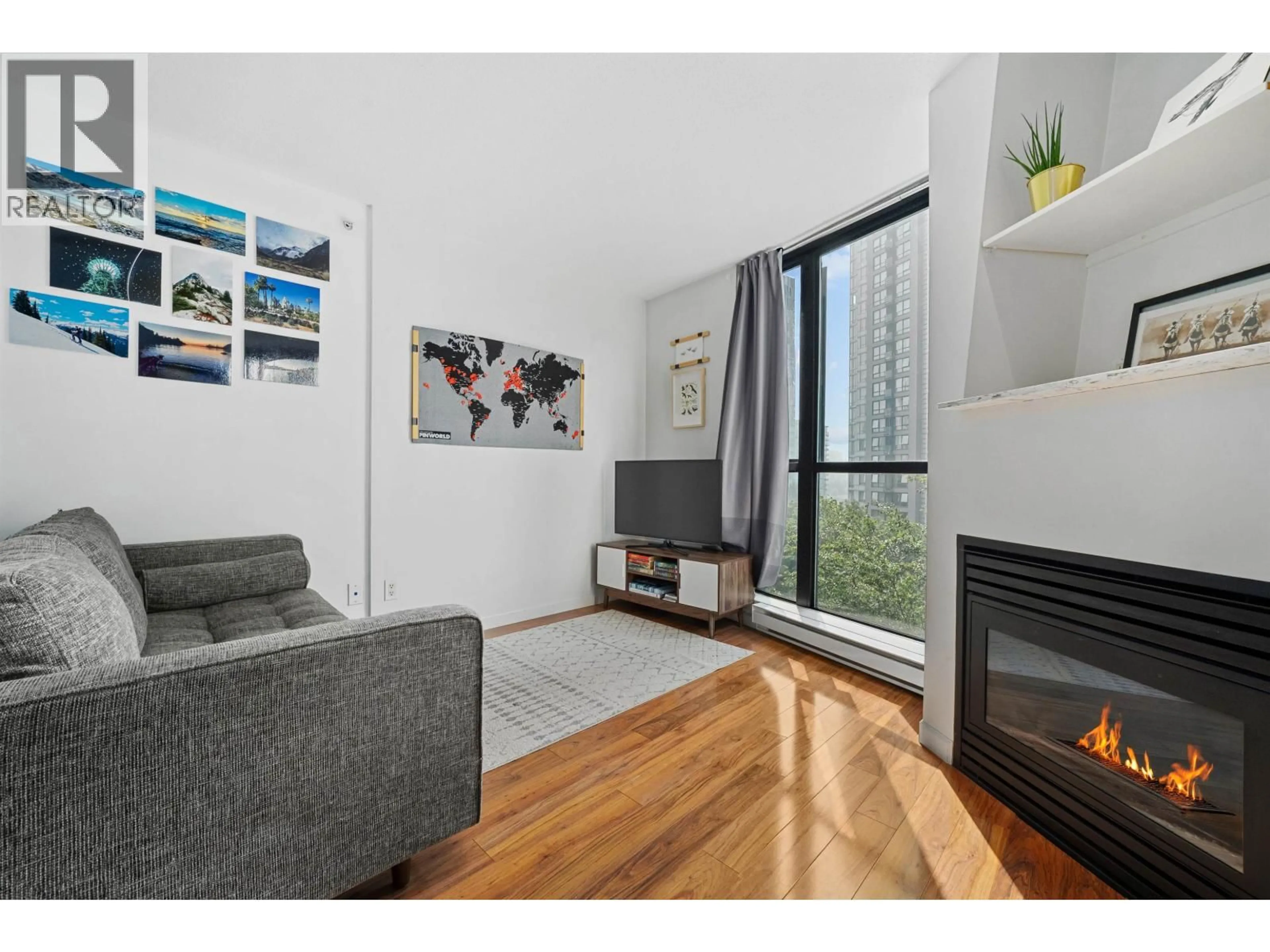 Living room with furniture, wood/laminate floor for 603 - 501 PACIFIC STREET, Vancouver British Columbia V6Z2X6