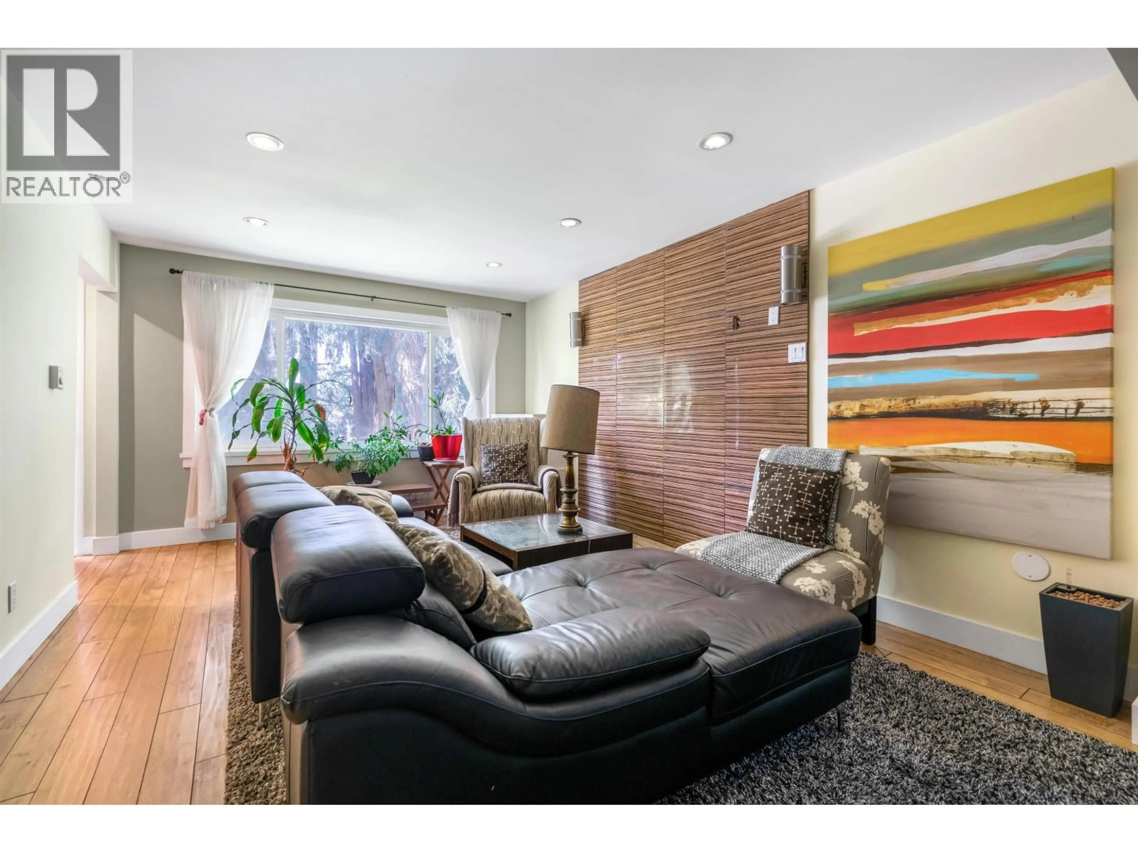 Living room with furniture, wood/laminate floor for 7814 ROSEWOOD STREET, Burnaby British Columbia V5E2H1