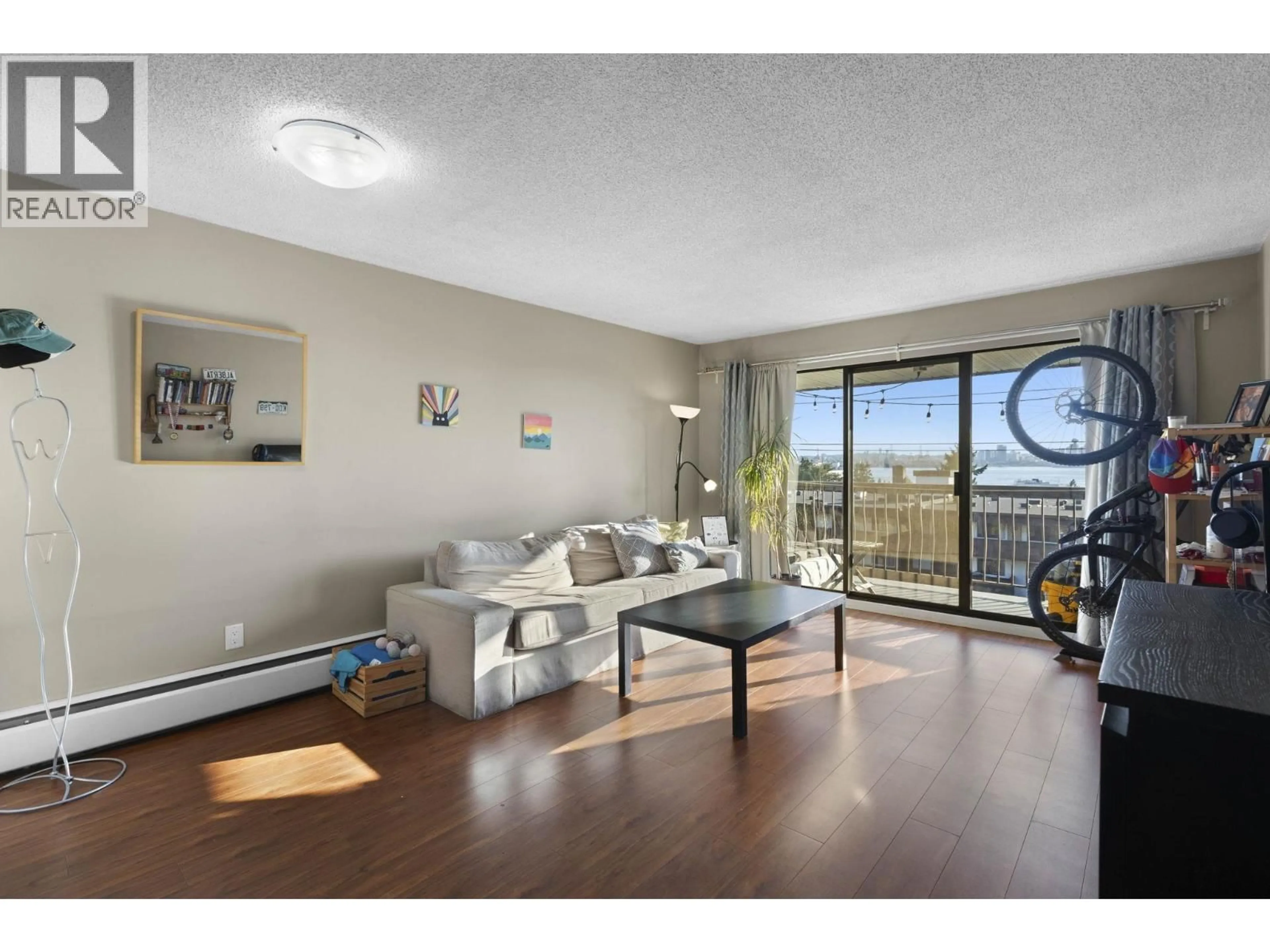 Living room with furniture, wood/laminate floor for 337 - 340 3RD STREET, North Vancouver British Columbia V7M1G4