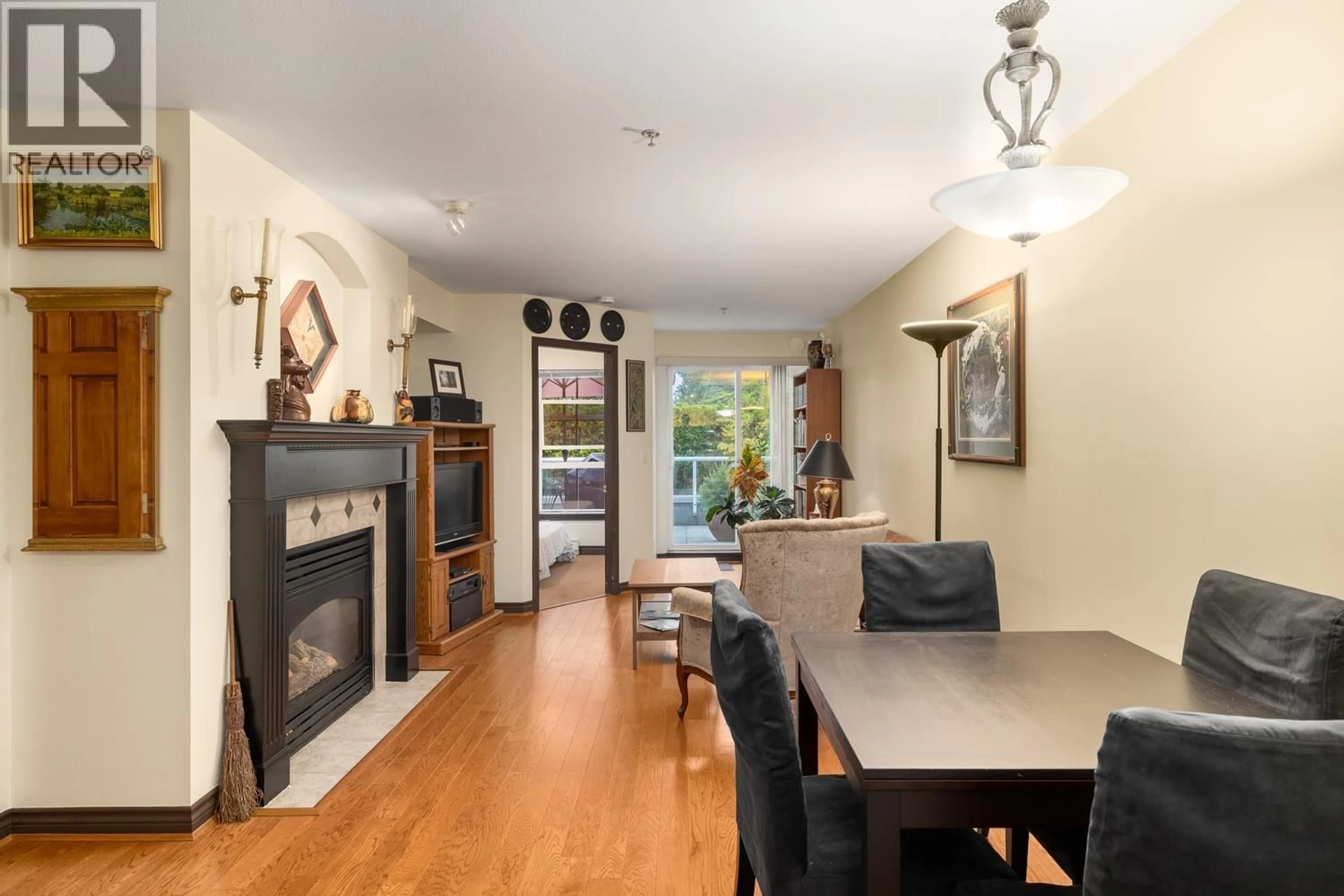Dining room, wood/laminate floor for 206 - 5723 COLLINGWOOD STREET, Vancouver British Columbia V6N4K6