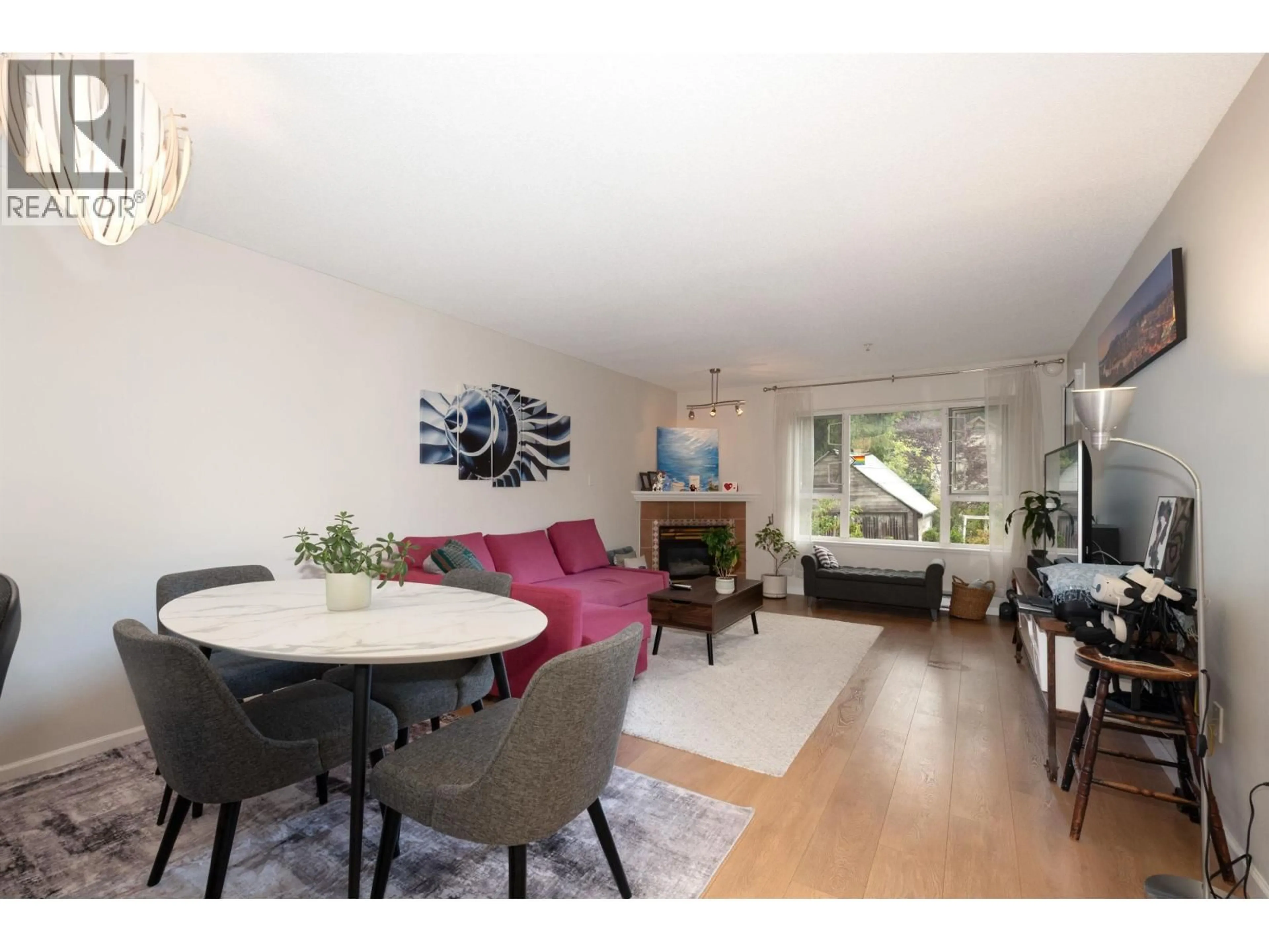 Living room with furniture, wood/laminate floor for 504 - 221 ELEVENTH STREET, New Westminster British Columbia V3M4C8