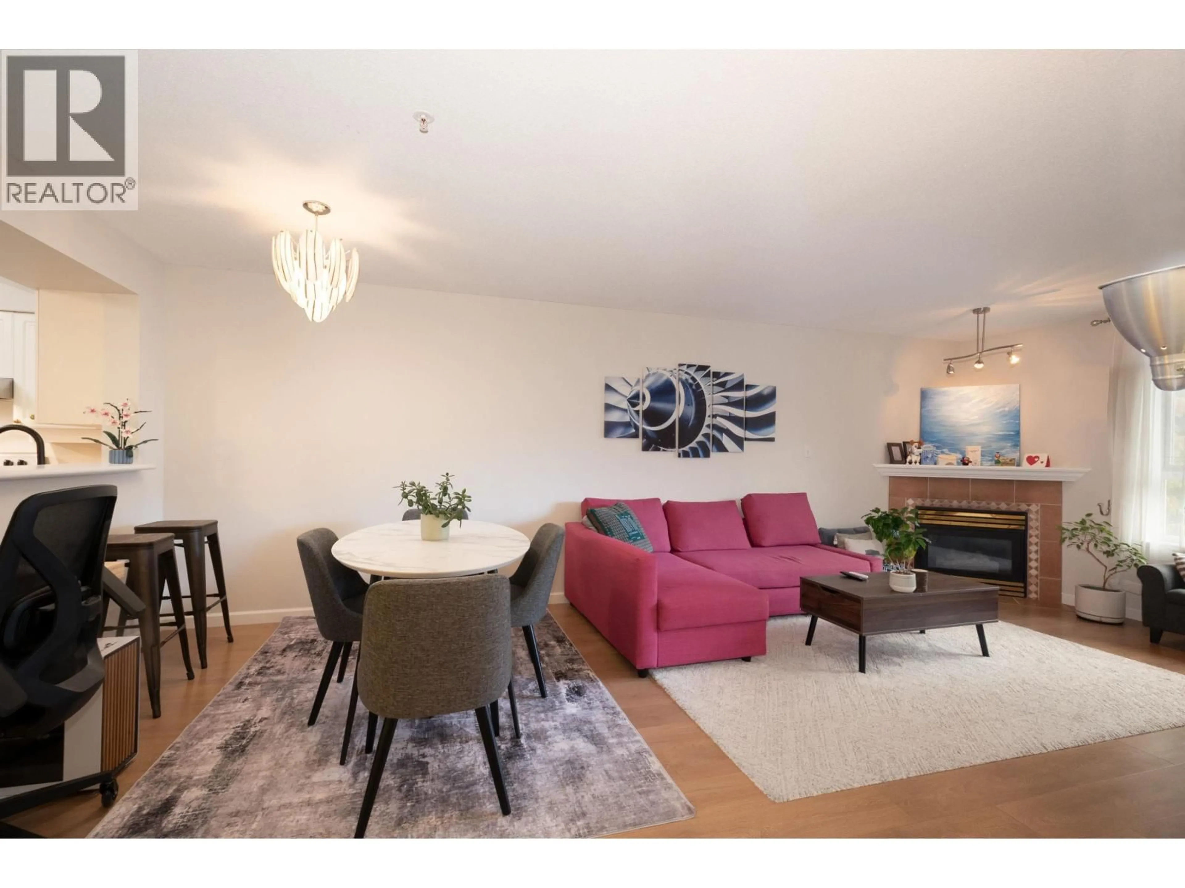 Living room with furniture, wood/laminate floor for 504 - 221 ELEVENTH STREET, New Westminster British Columbia V3M4C8