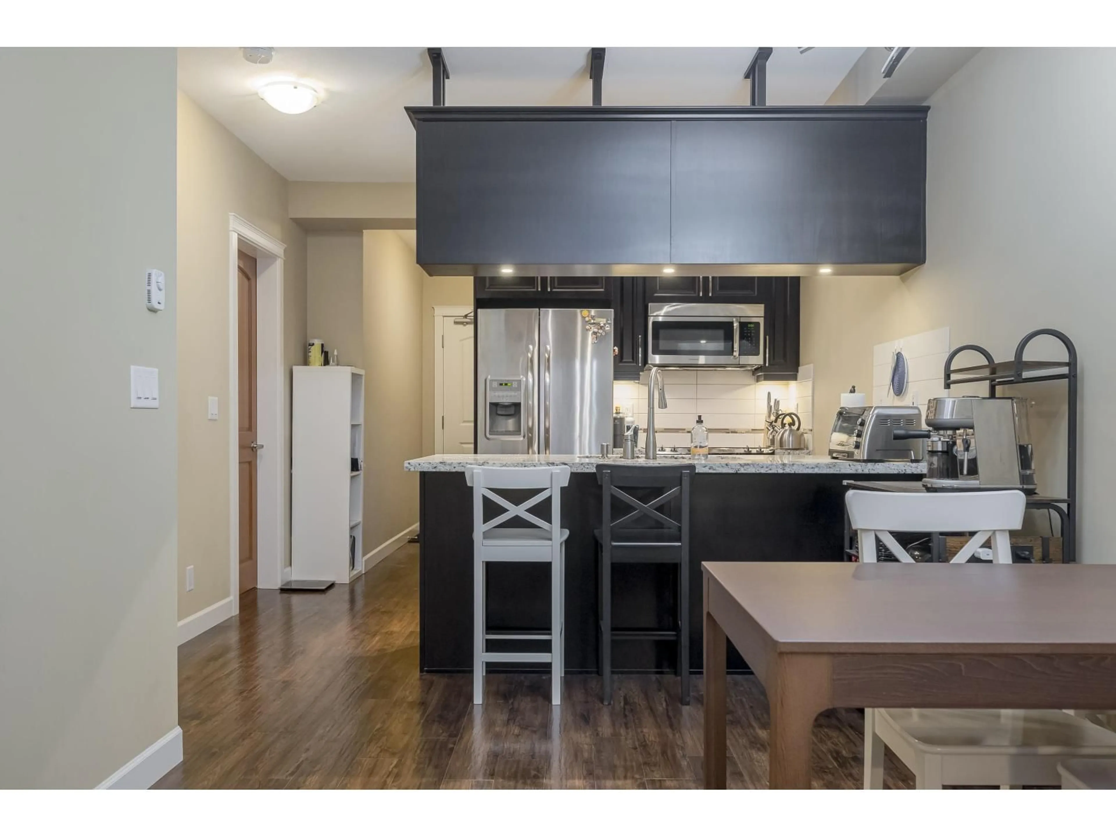 Open concept kitchen, wood/laminate floor for 263 - 8258 207A, Langley British Columbia V2Y0N4