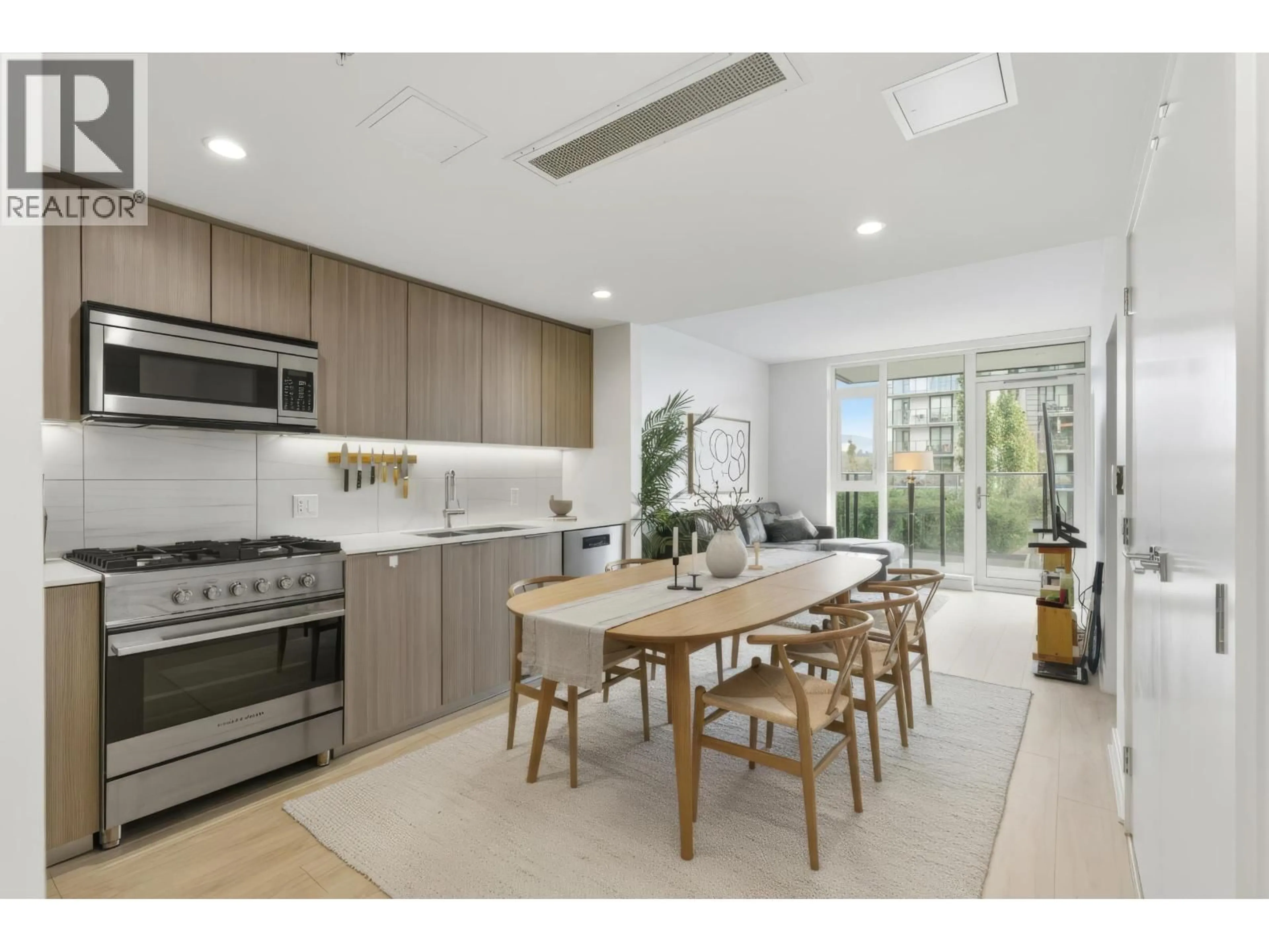 Open concept kitchen, ceramic/tile floor for 602 - 1401 HUNTER STREET, North Vancouver British Columbia V7J0E2