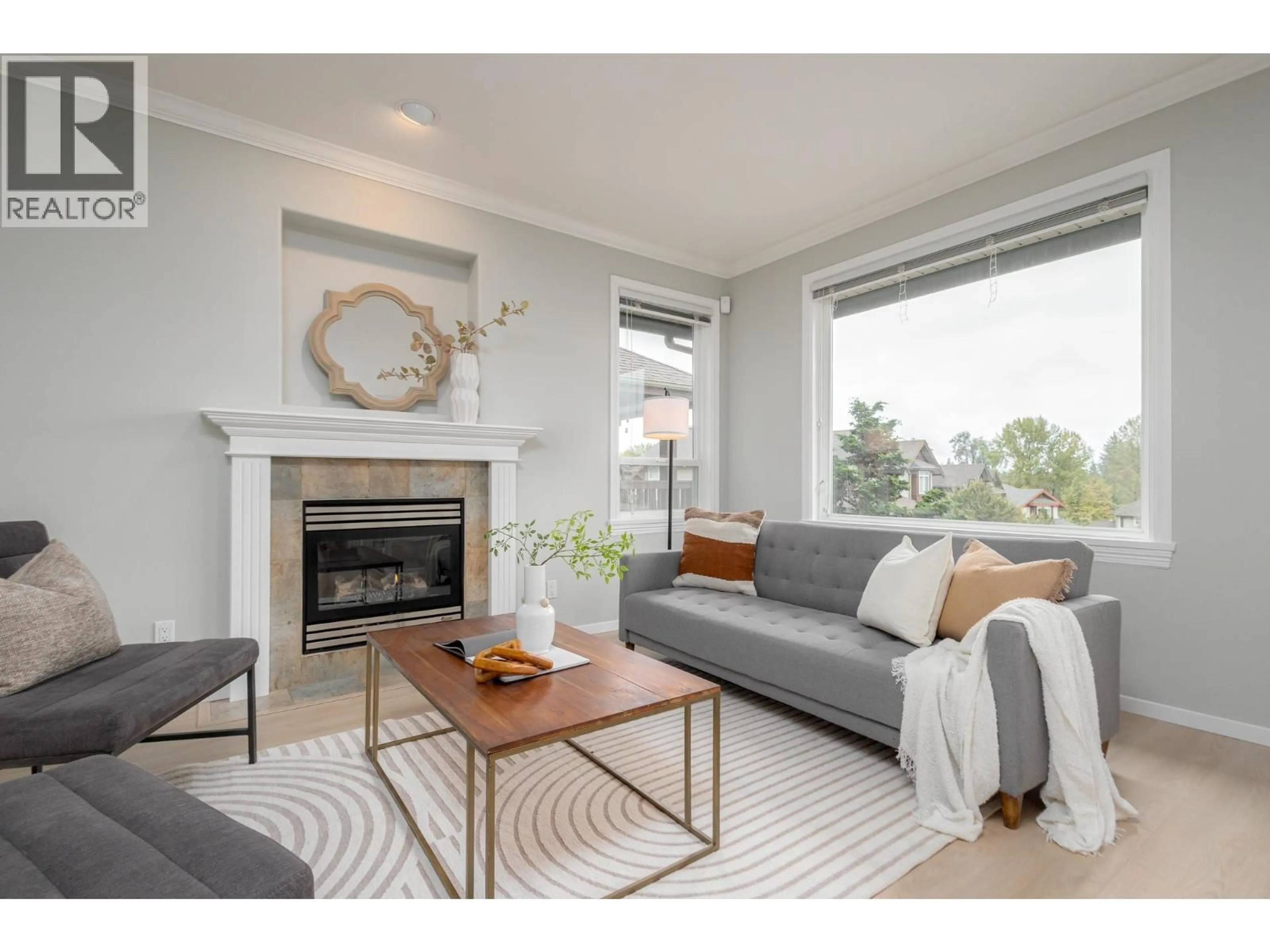 Living room with furniture, wood/laminate floor for 35 - 2381 ARGUE STREET, Port Coquitlam British Columbia V3C6P9