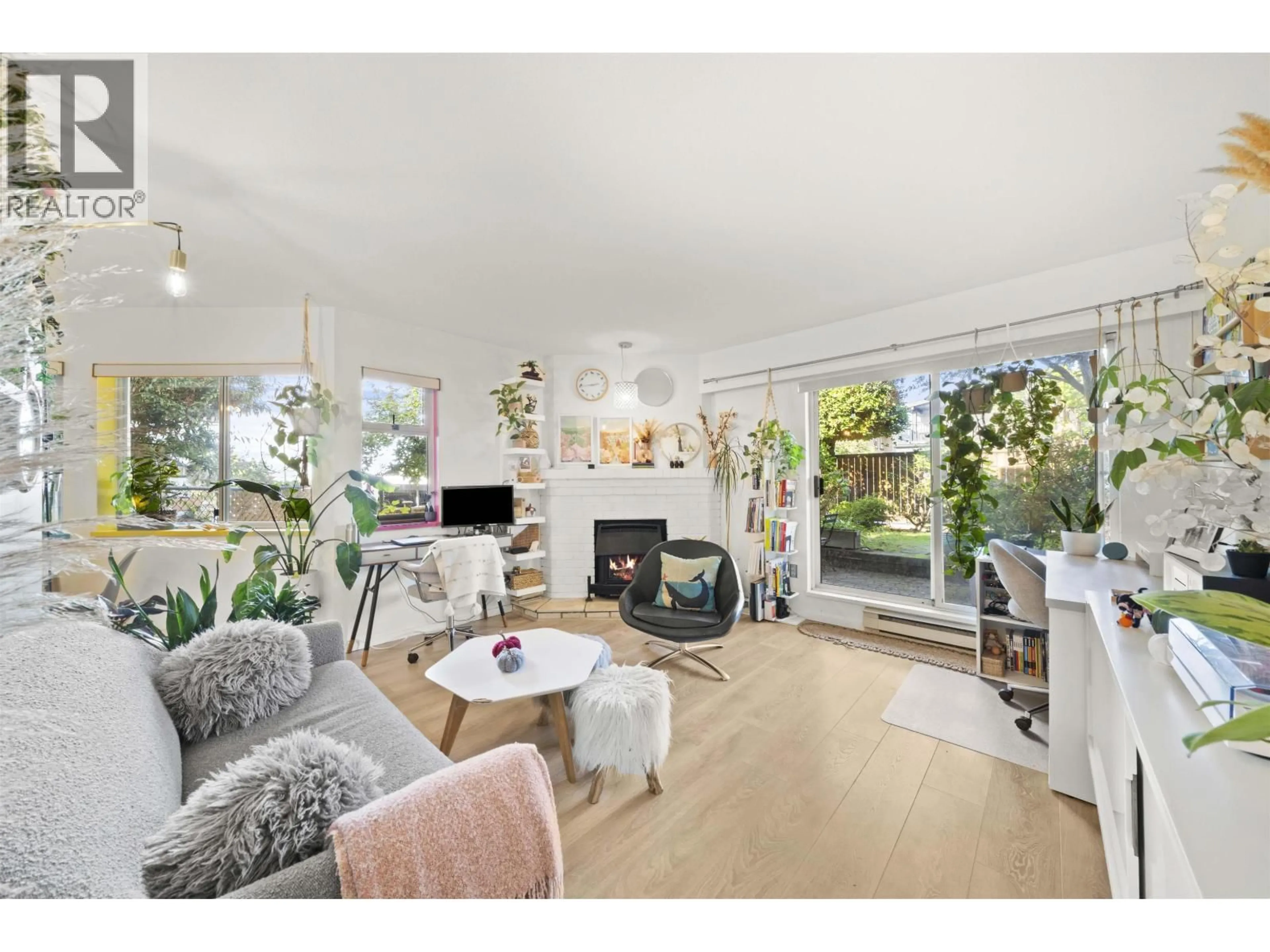 Living room with furniture, wood/laminate floor for 101 - 3861 ALBERT STREET, Burnaby British Columbia V5C2C8