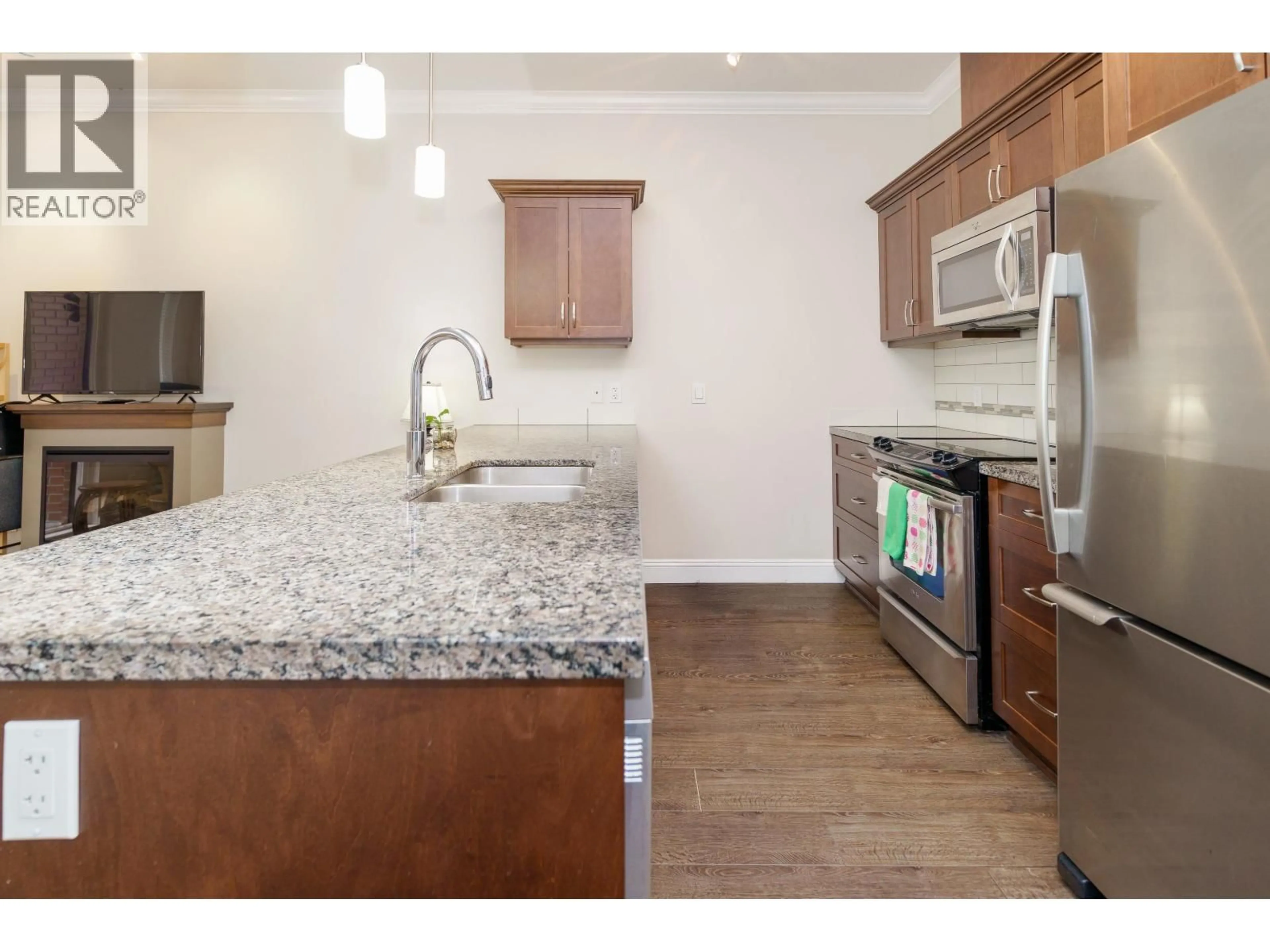 Open concept kitchen, unknown for 104 - 11882 226 STREET, Maple Ridge British Columbia V2X9C7