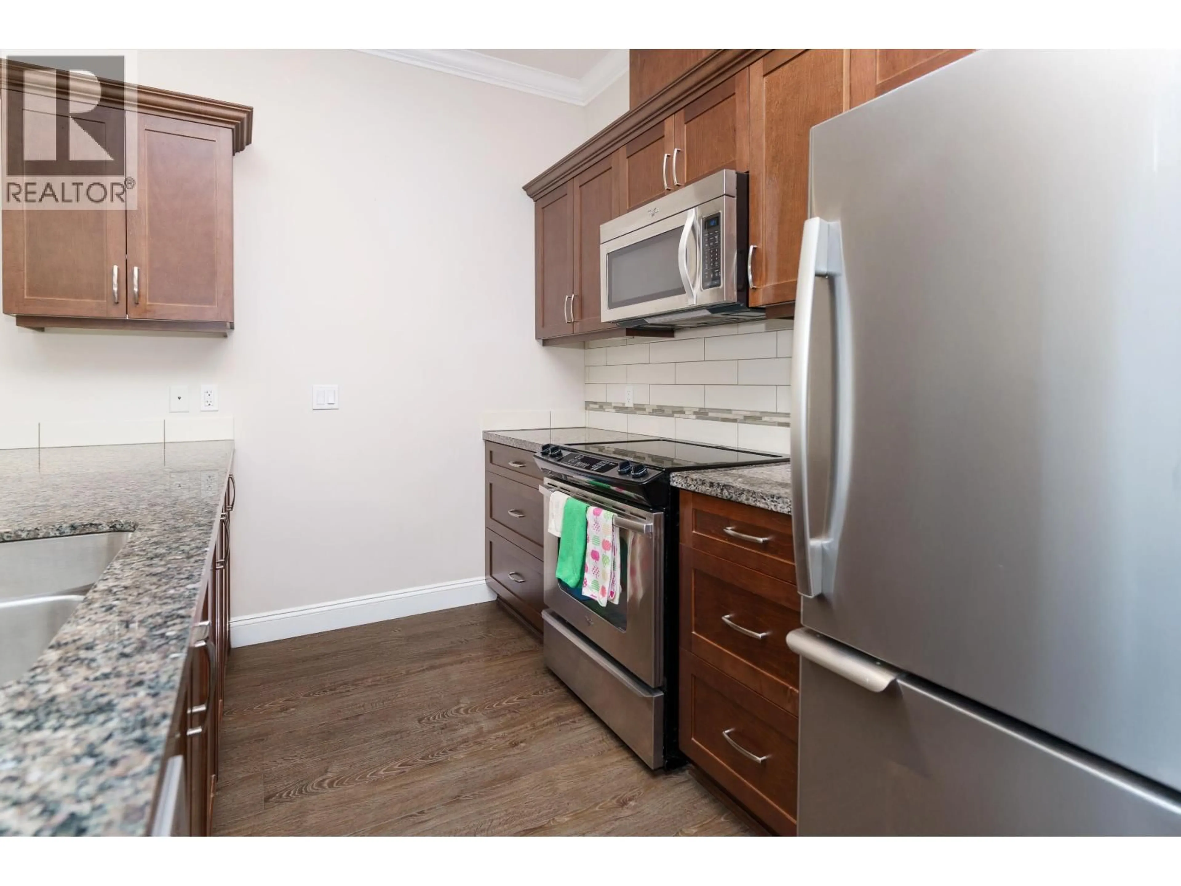 Standard kitchen, wood/laminate floor for 104 - 11882 226 STREET, Maple Ridge British Columbia V2X9C7