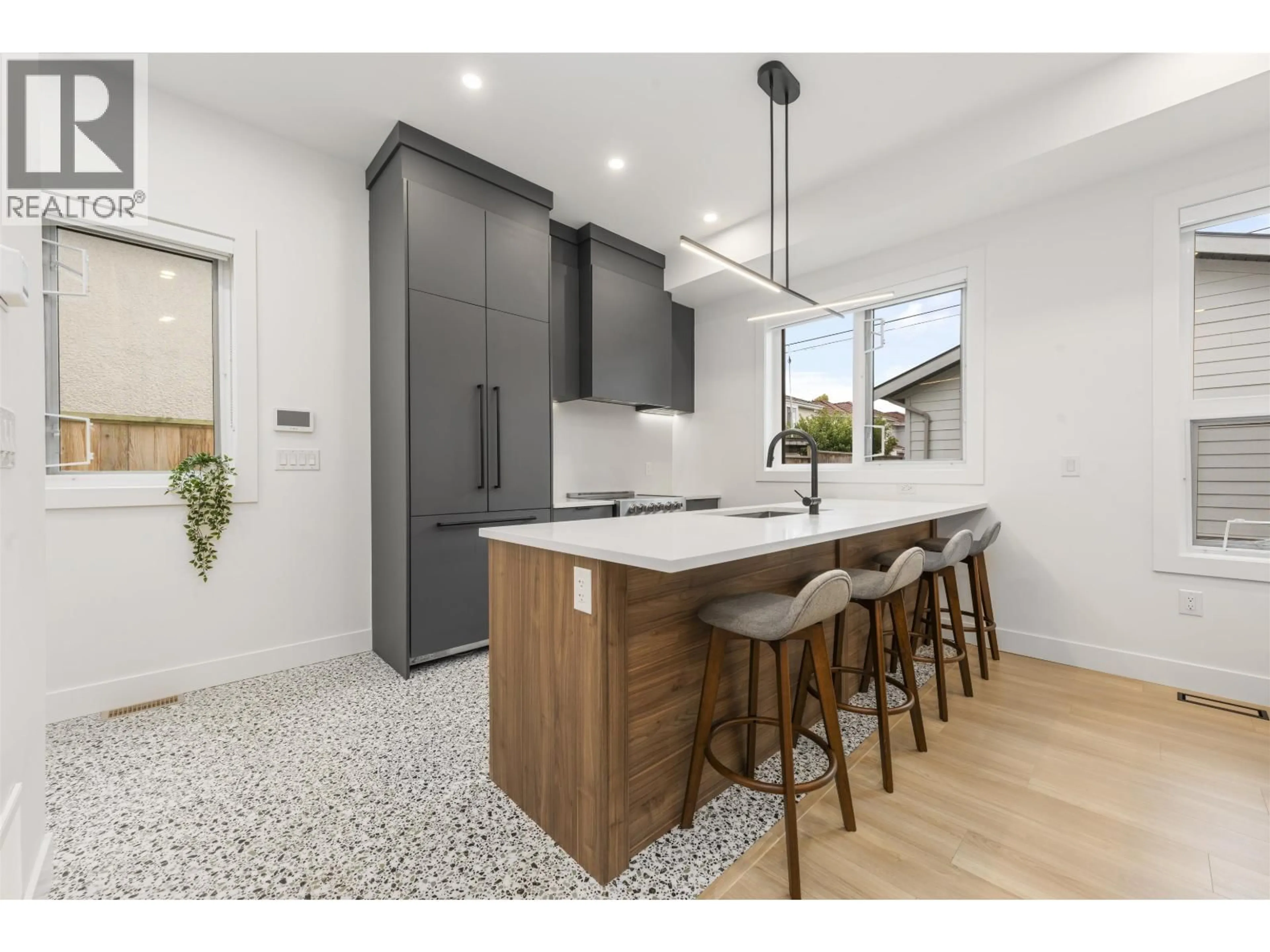 Open concept kitchen, ceramic/tile floor for 4014 RUPERT STREET, Vancouver British Columbia V5R2H3