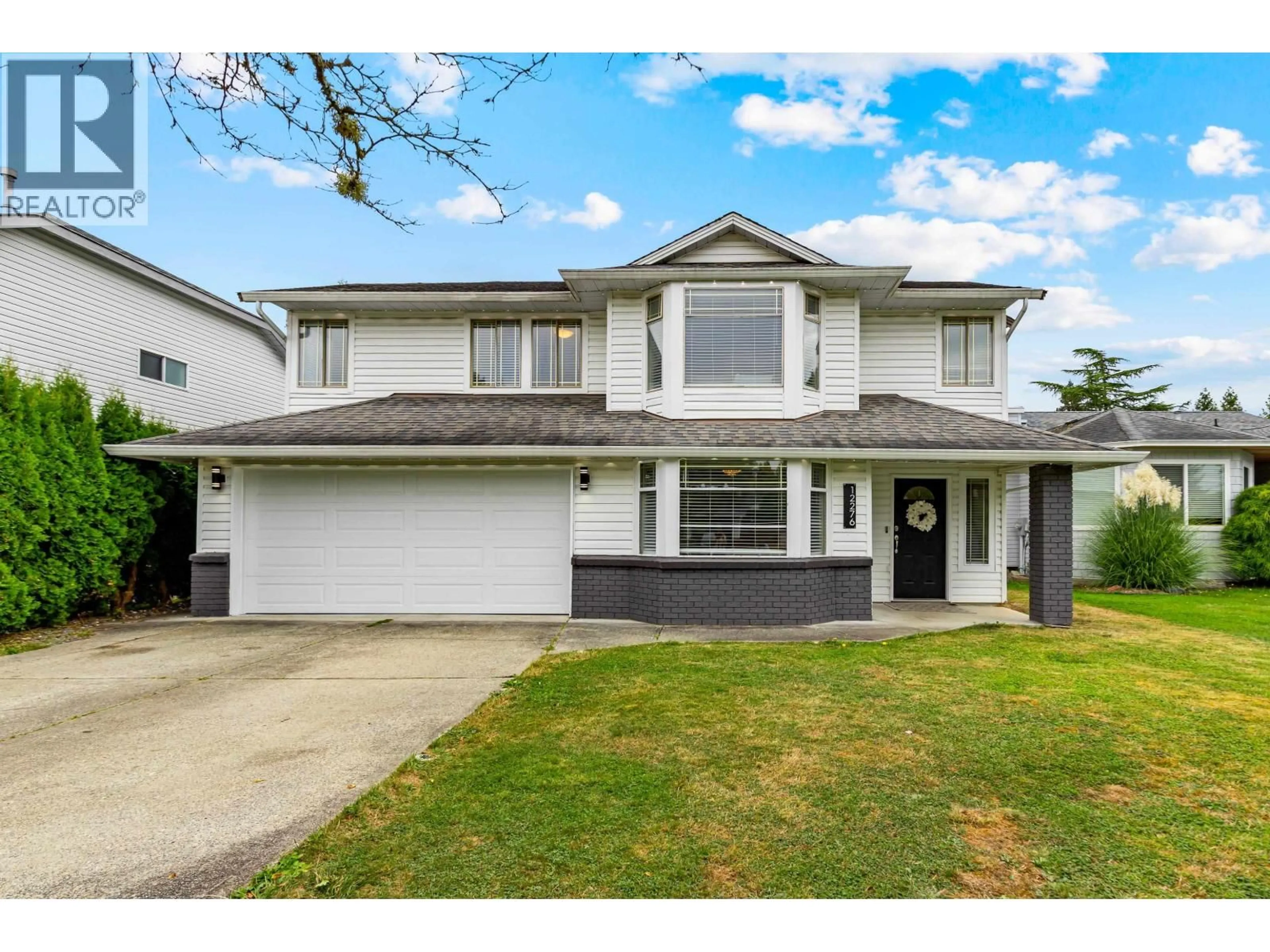 Home with vinyl exterior material, street for 12276 AURORA STREET, Maple Ridge British Columbia V2X0R2