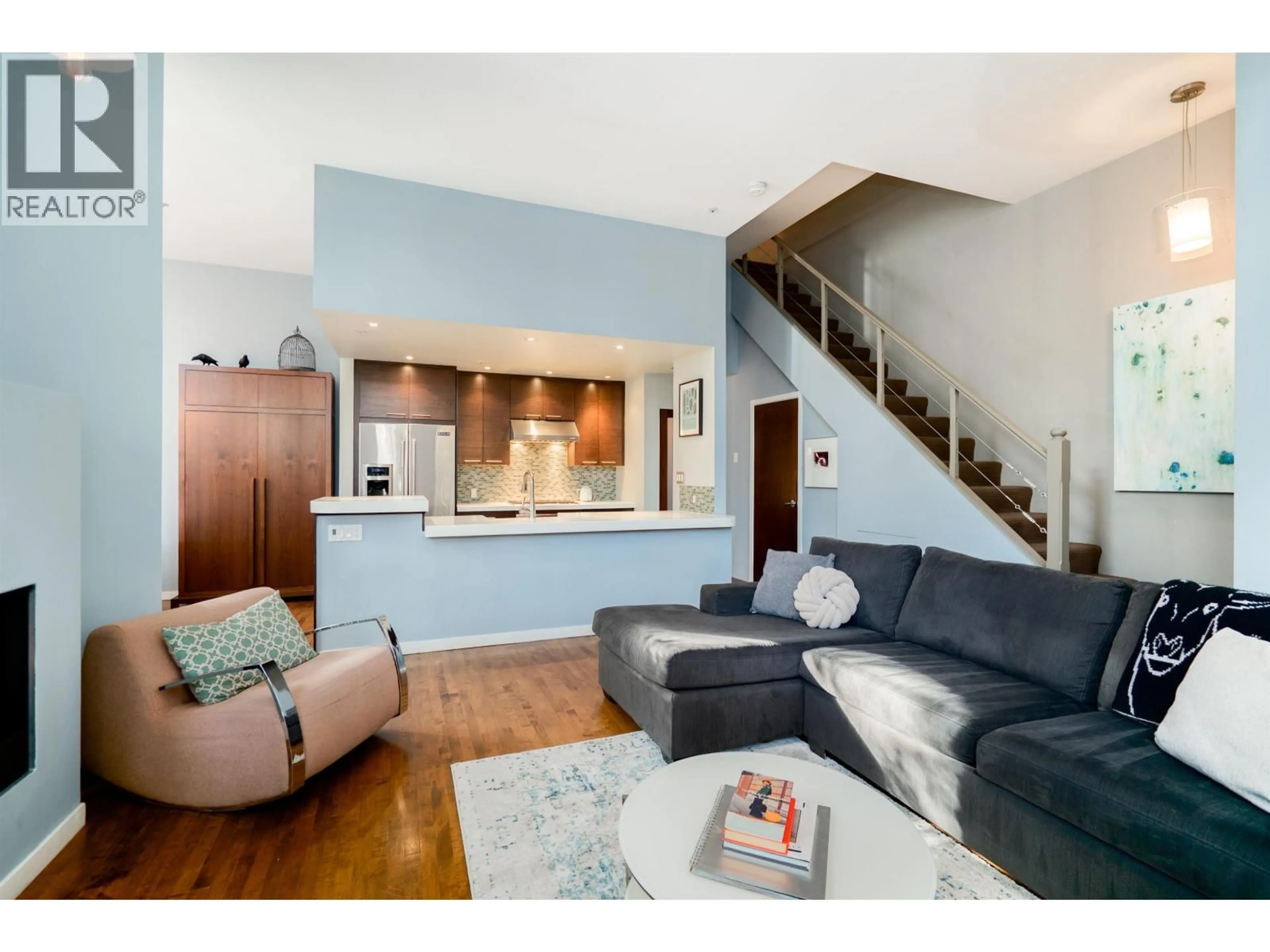 Living room with furniture, wood/laminate floor for 2315 ASH STREET, Vancouver British Columbia V5Z3C3