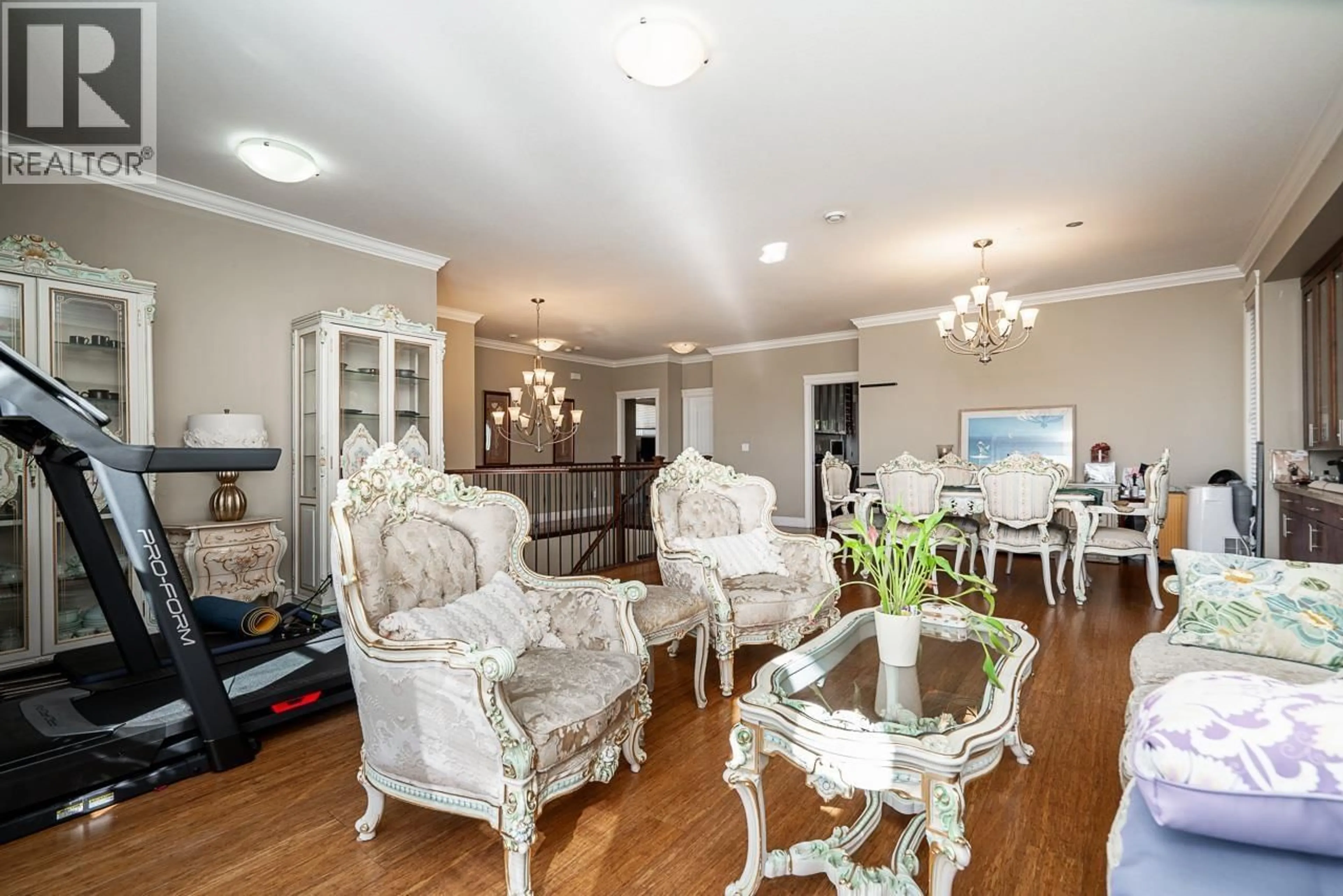 Living room with furniture, wood/laminate floor for 1935 BRUNETTE AVENUE, Coquitlam British Columbia V3K1H8