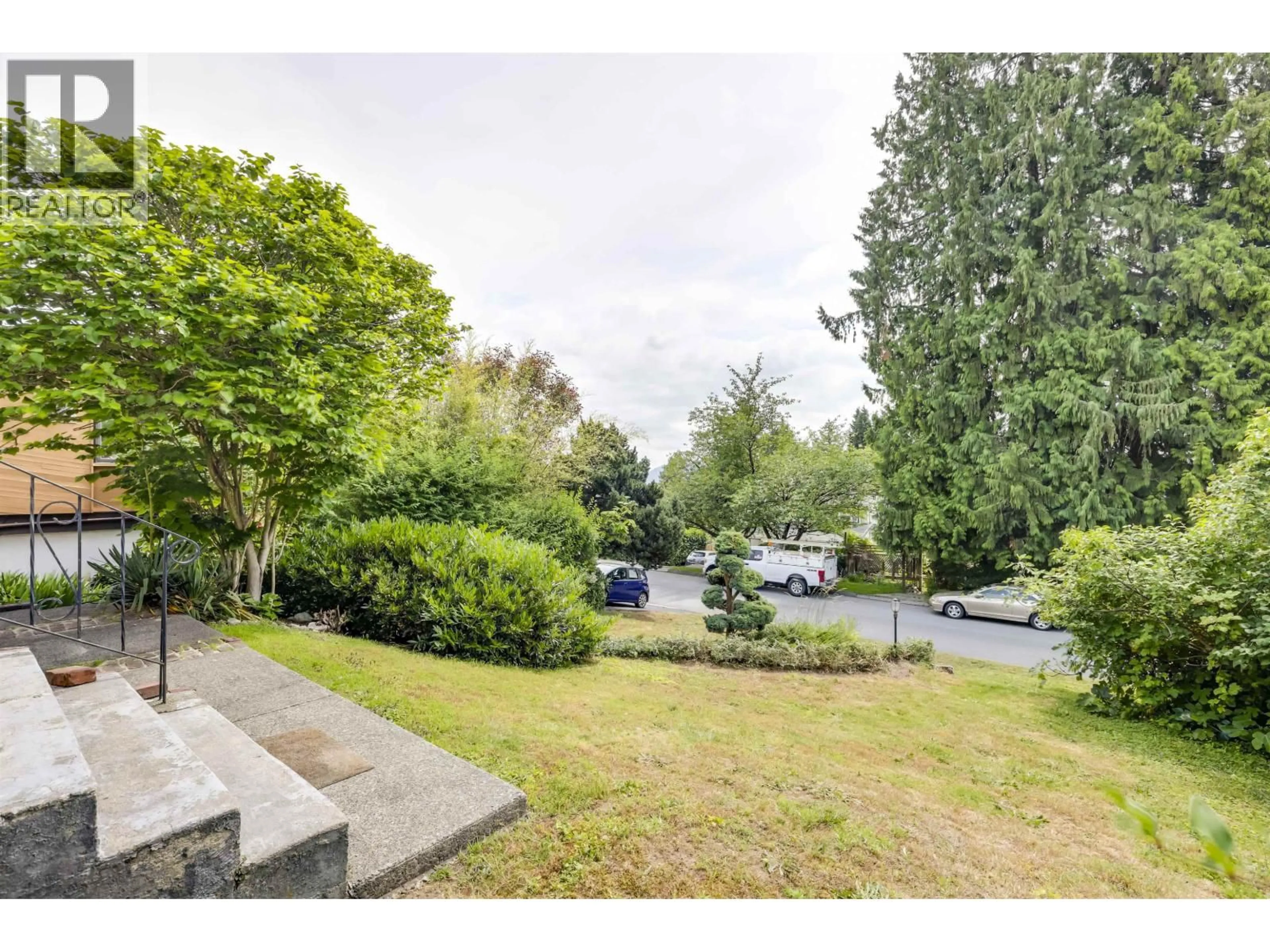 A pic from outside/outdoor area/front of a property/back of a property/a pic from drone, forest/trees view for 1118 CLOVERLEY STREET, North Vancouver British Columbia V7L1N6
