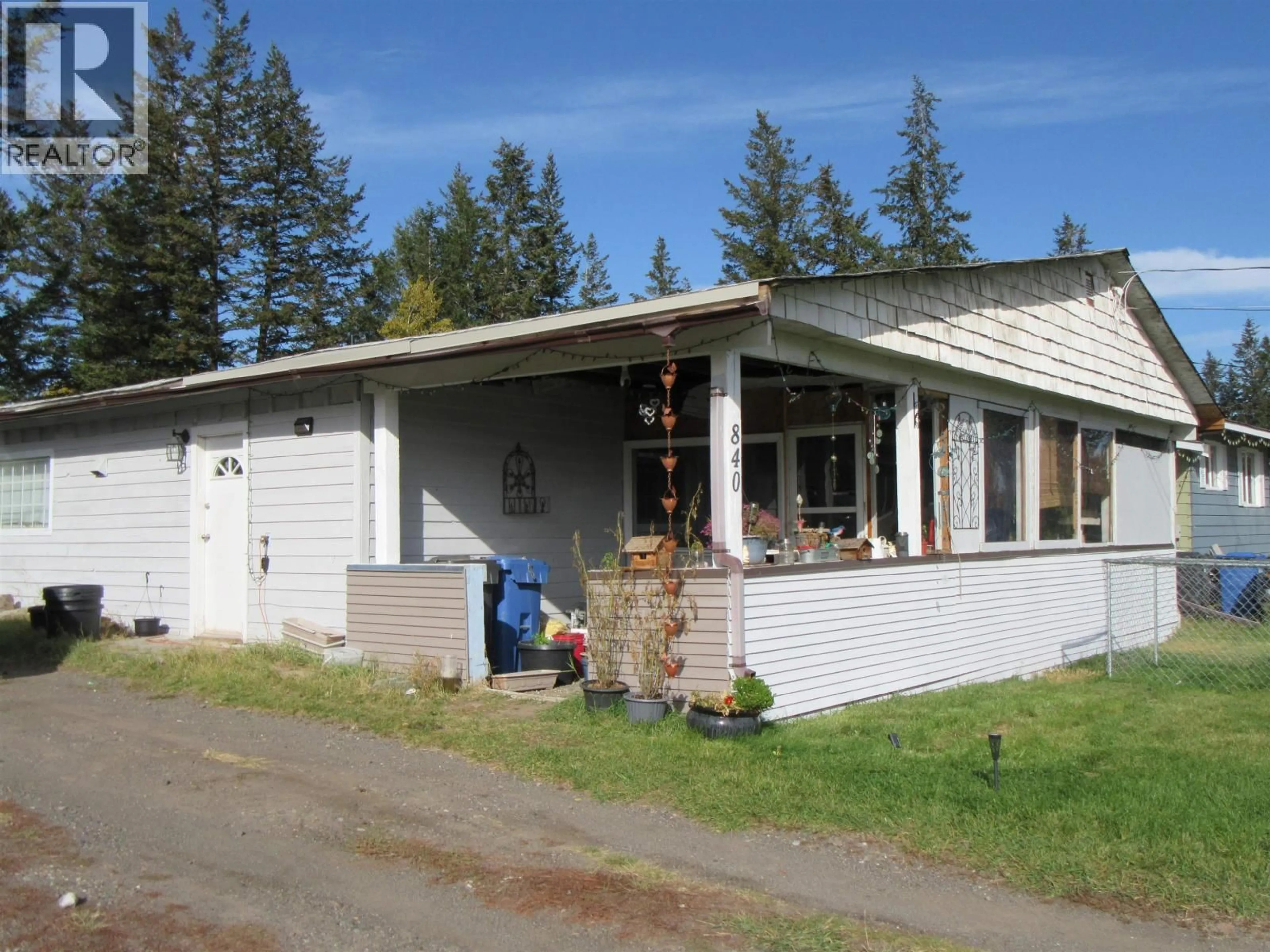 Home with vinyl exterior material, street for 840 SCOTT ROAD, 100 Mile House British Columbia V0K2E0