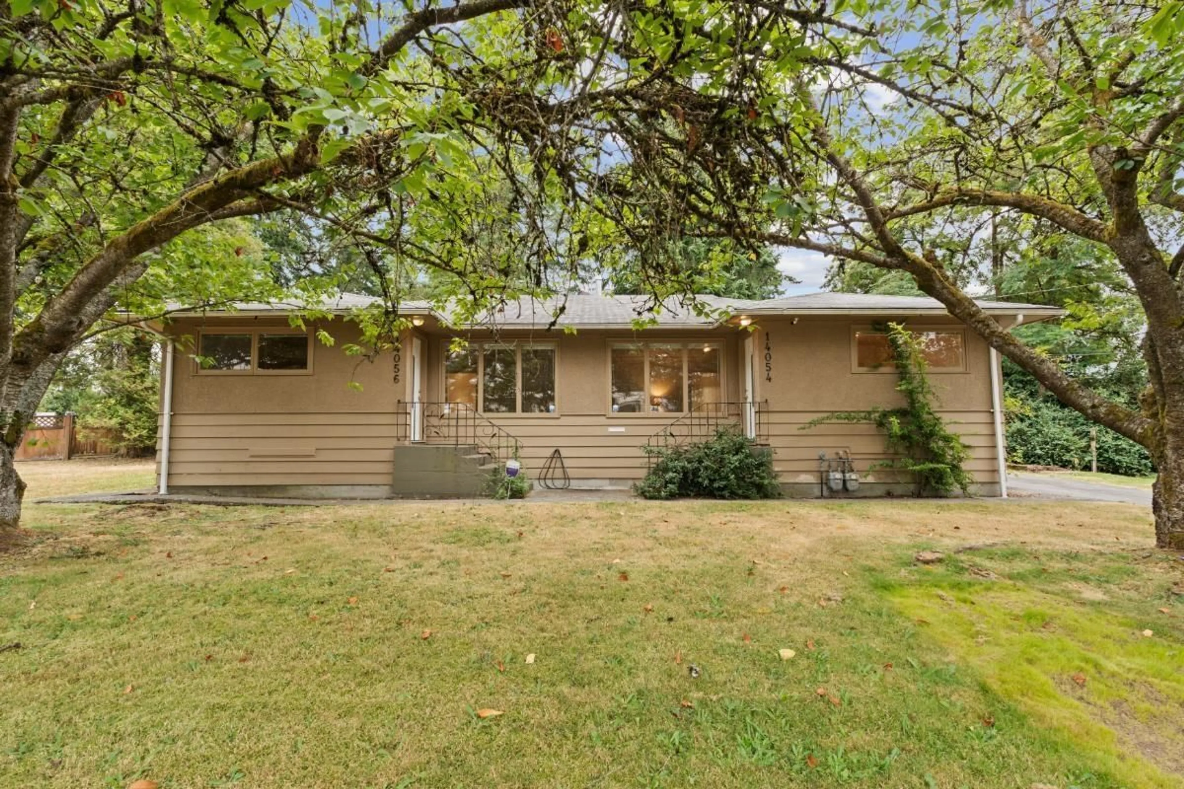 Home with vinyl exterior material, street for 14054 ANTRIM, Surrey British Columbia V3R5H7