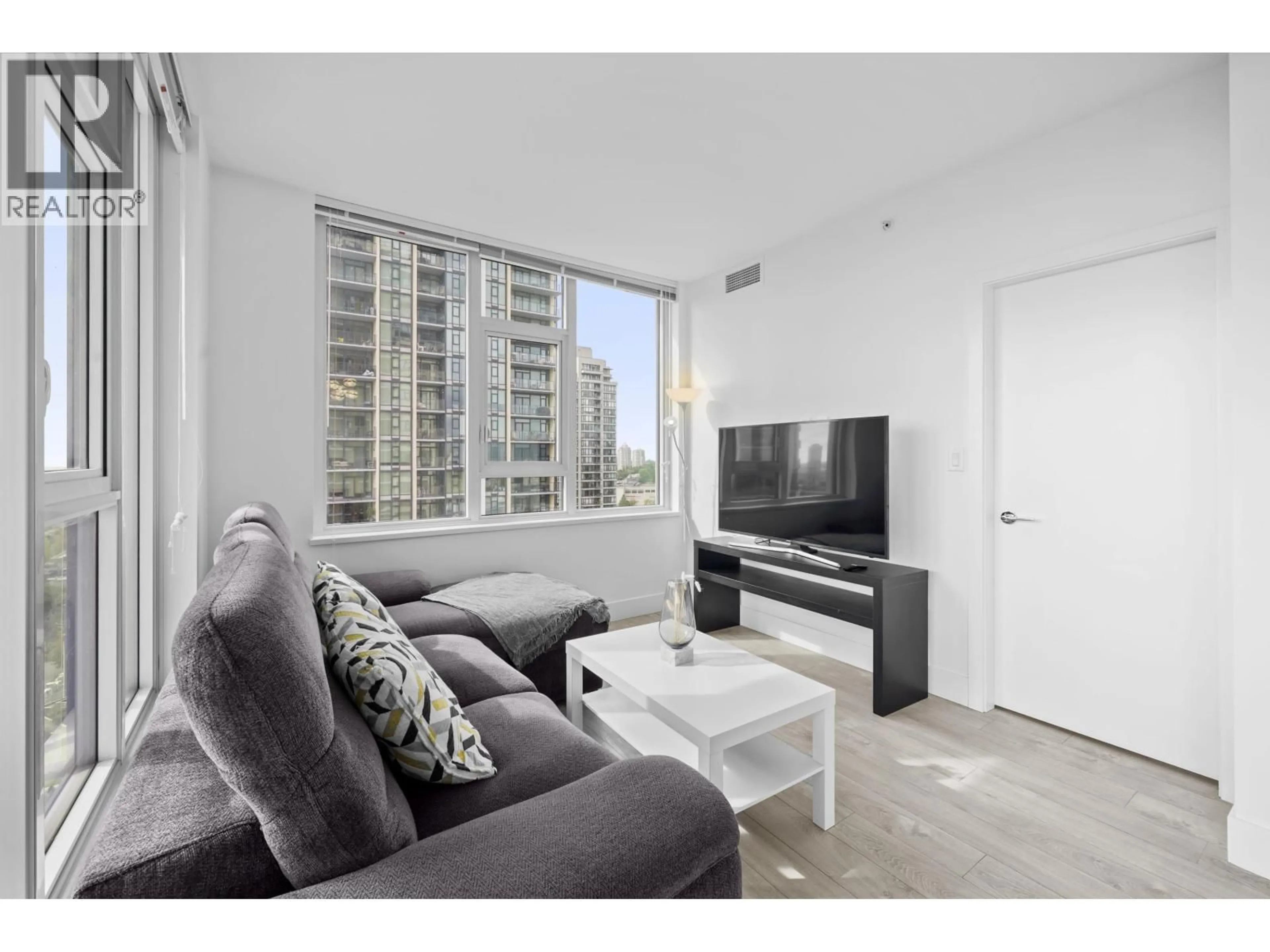Living room with furniture, unknown for 1610 - 7303 NOBLE LANE, Burnaby British Columbia V3N0H2