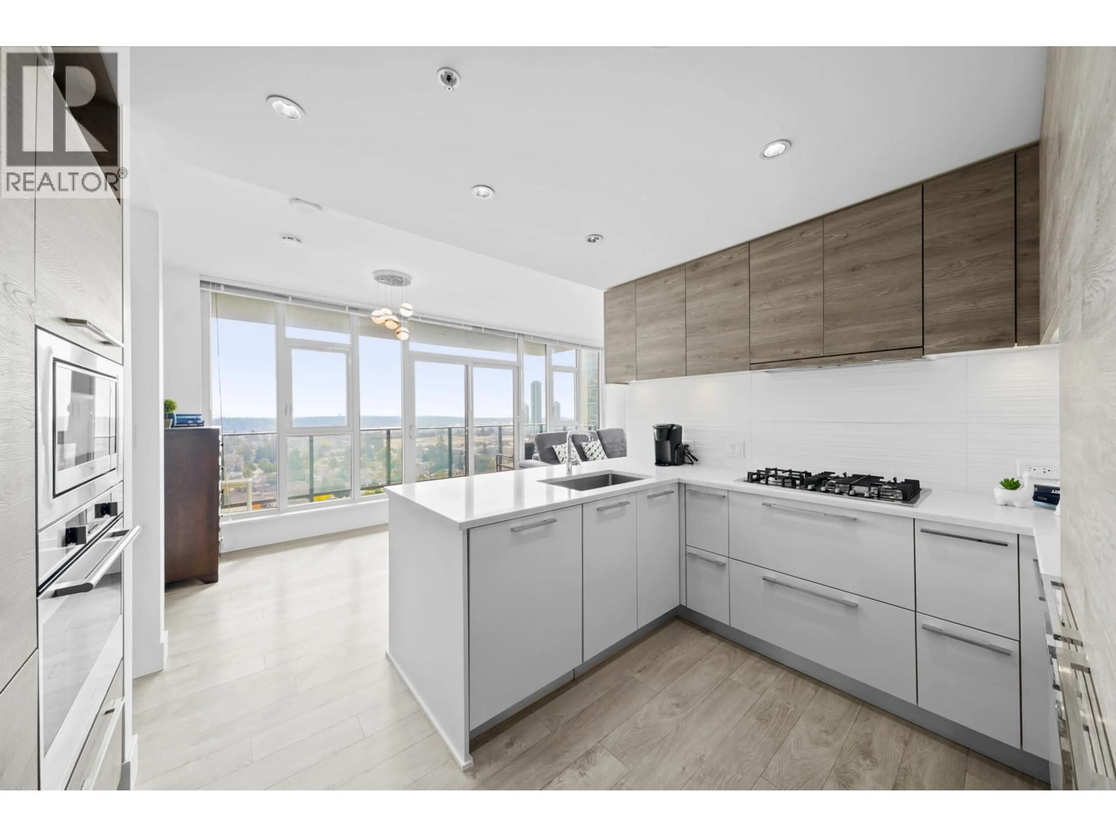 Open concept kitchen, ceramic/tile floor for 1610 - 7303 NOBLE LANE, Burnaby British Columbia V3N0H2