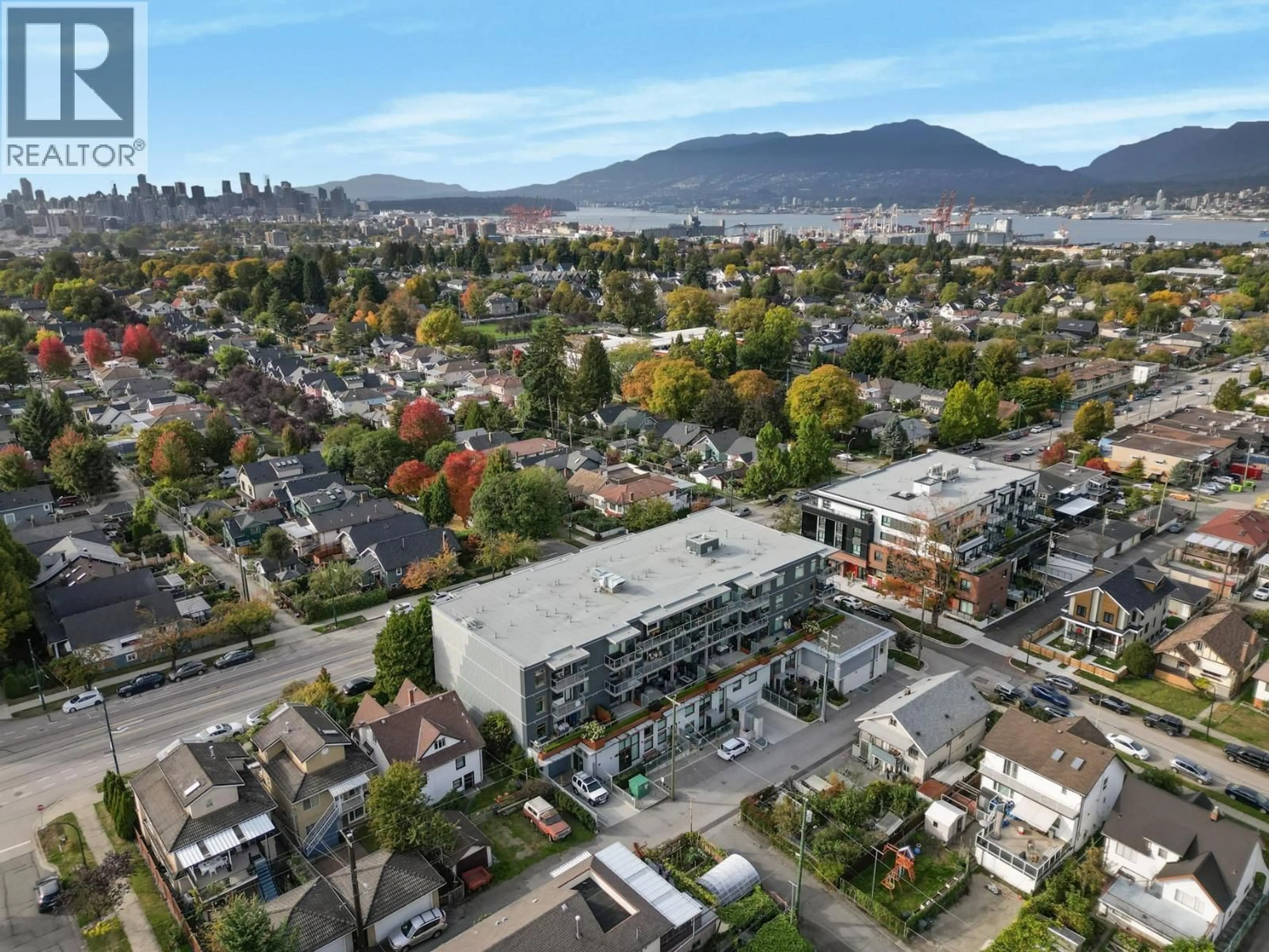 A pic from outside/outdoor area/front of a property/back of a property/a pic from drone, mountain view for 202 - 2408 GRANT STREET, Vancouver British Columbia V5K3G4