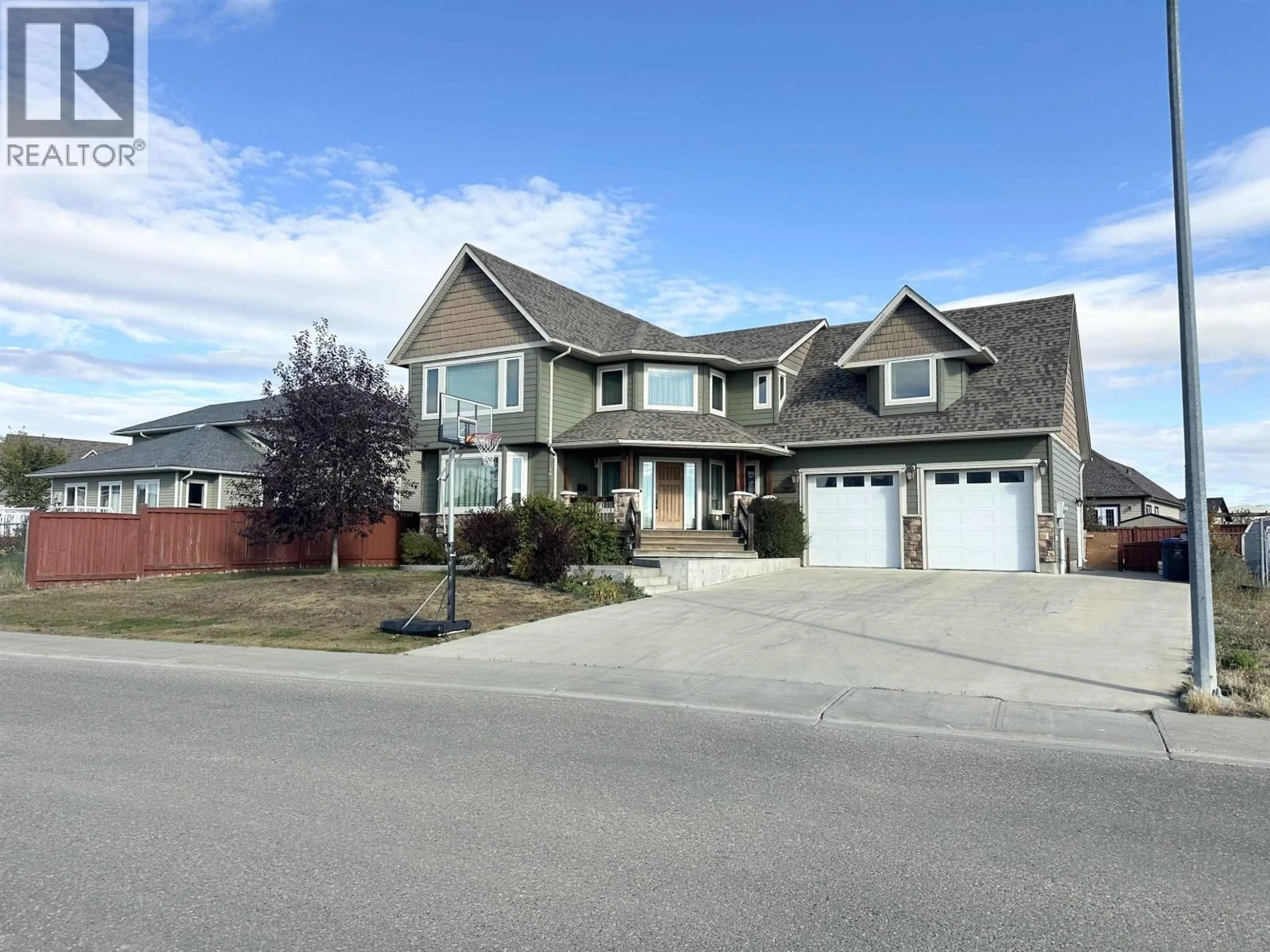 Home with vinyl exterior material, street for 11023 88 STREET, Fort St. John British Columbia V1J7G5