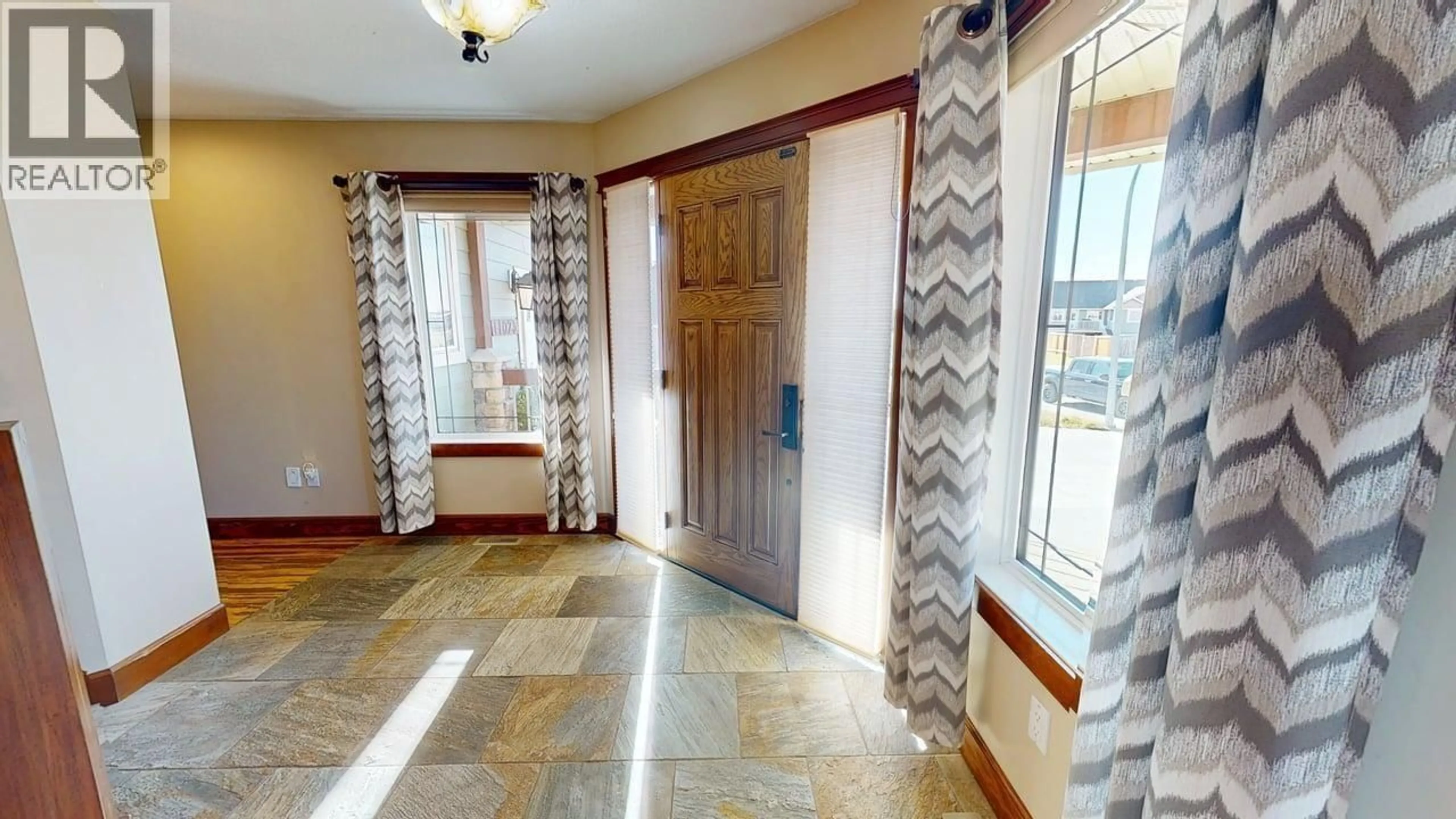 Indoor foyer for 11023 88 STREET, Fort St. John British Columbia V1J7G5
