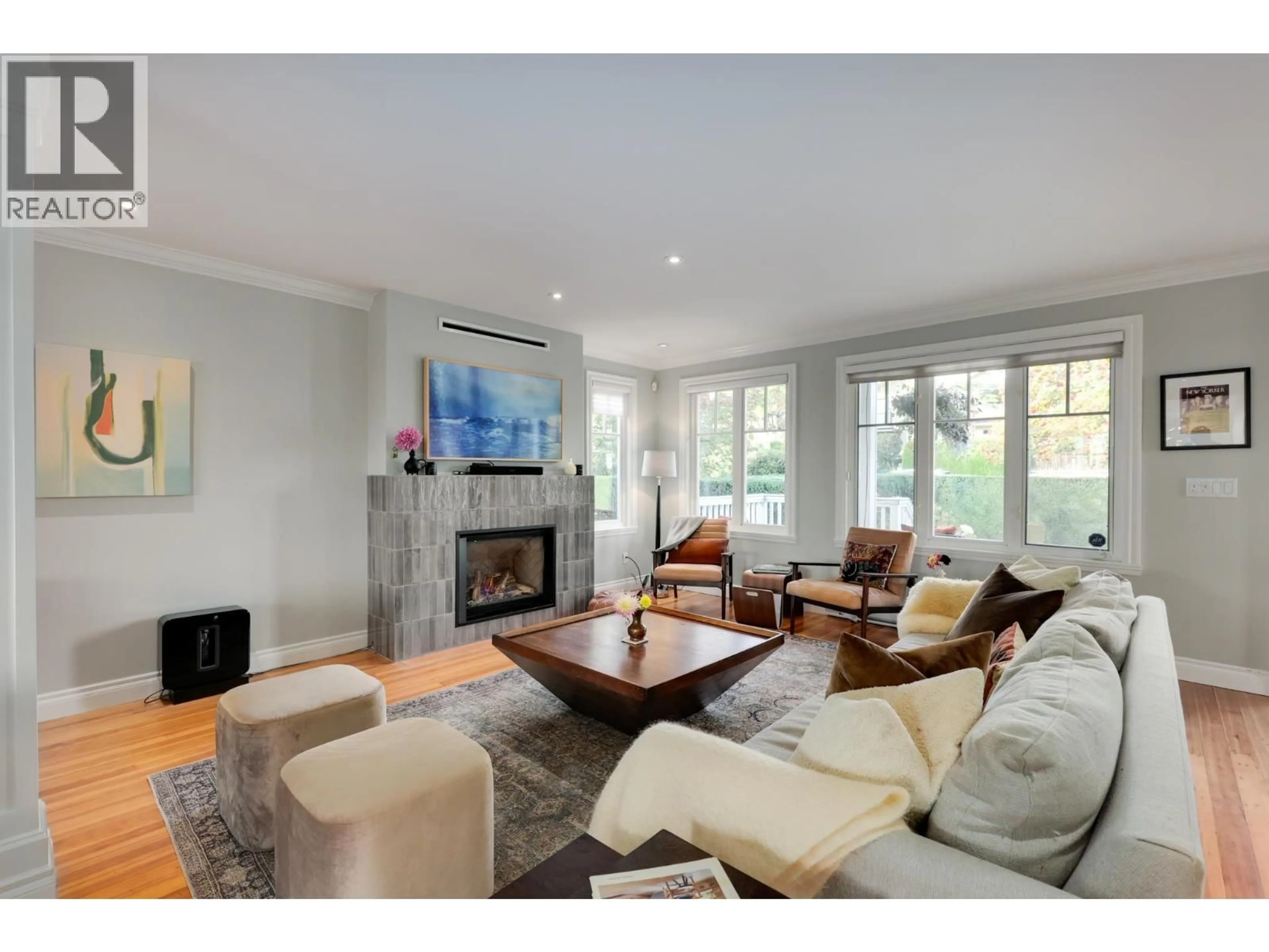 Living room with furniture, wood/laminate floor for 563 6TH STREET, North Vancouver British Columbia V7L1R2