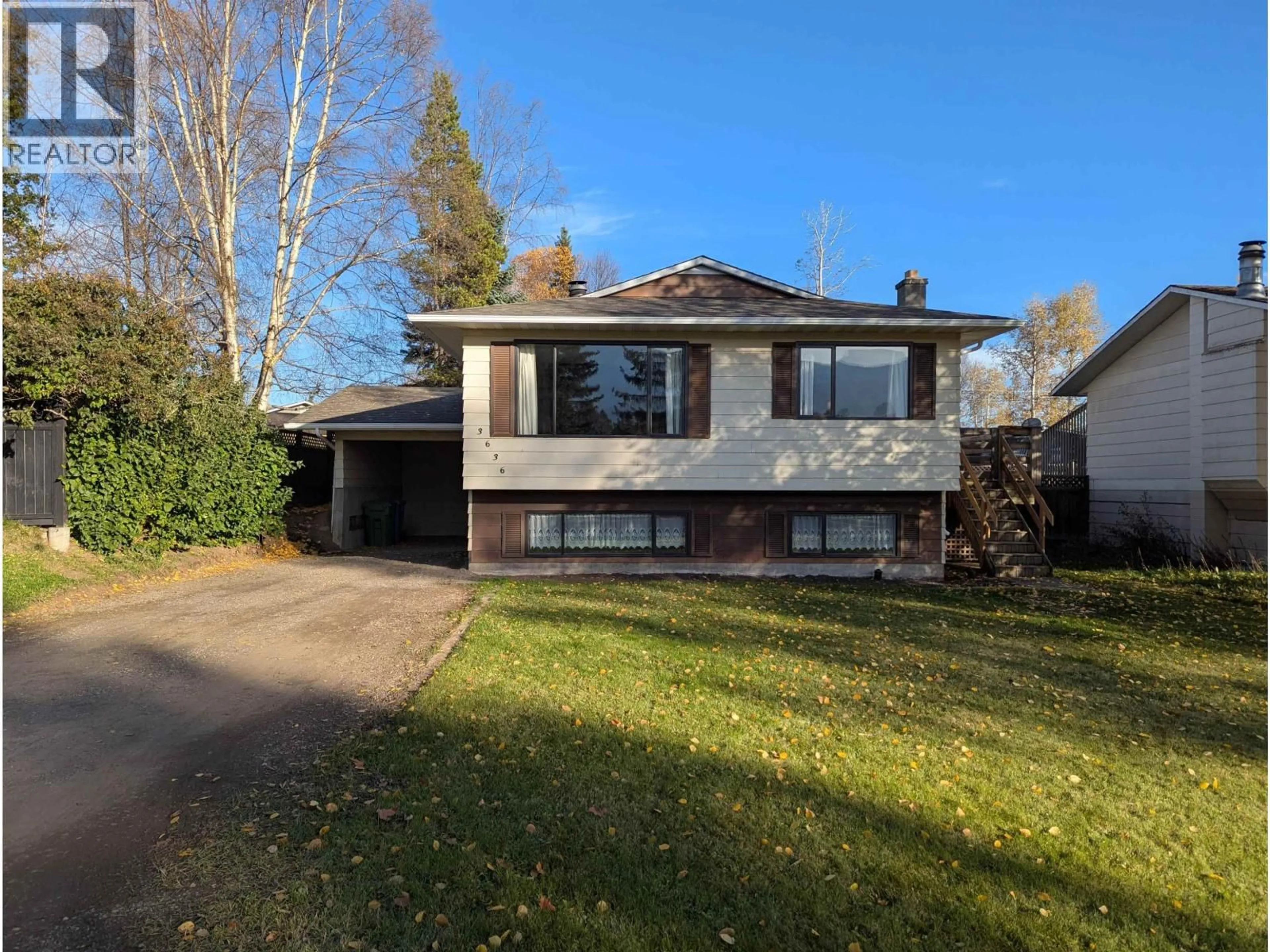 A pic from outside/outdoor area/front of a property/back of a property/a pic from drone, street for 3636 18TH AVENUE, Smithers British Columbia V0J2N0