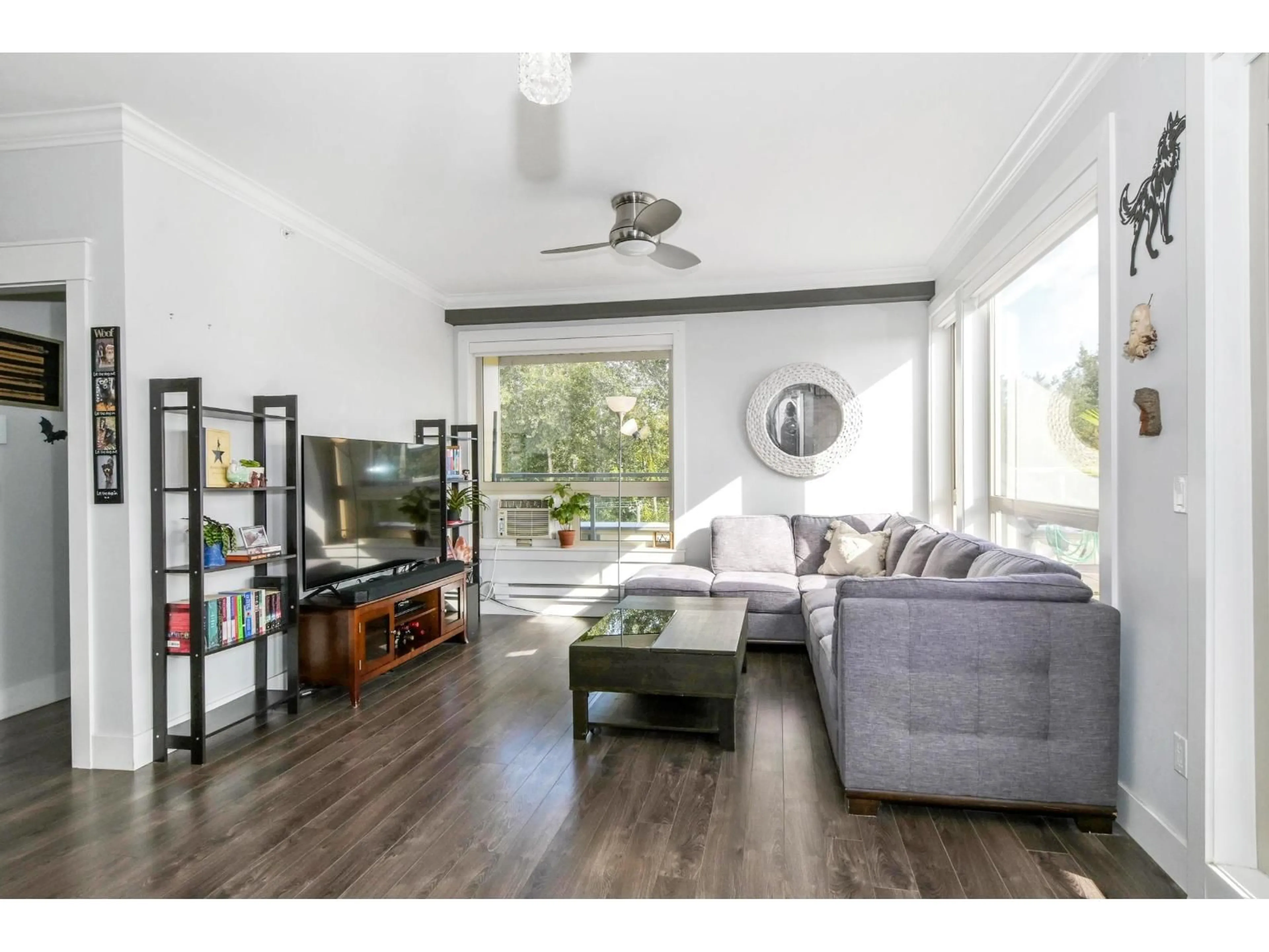Living room with furniture, wood/laminate floor for 503 - 19228 64, Surrey British Columbia V3S7C9