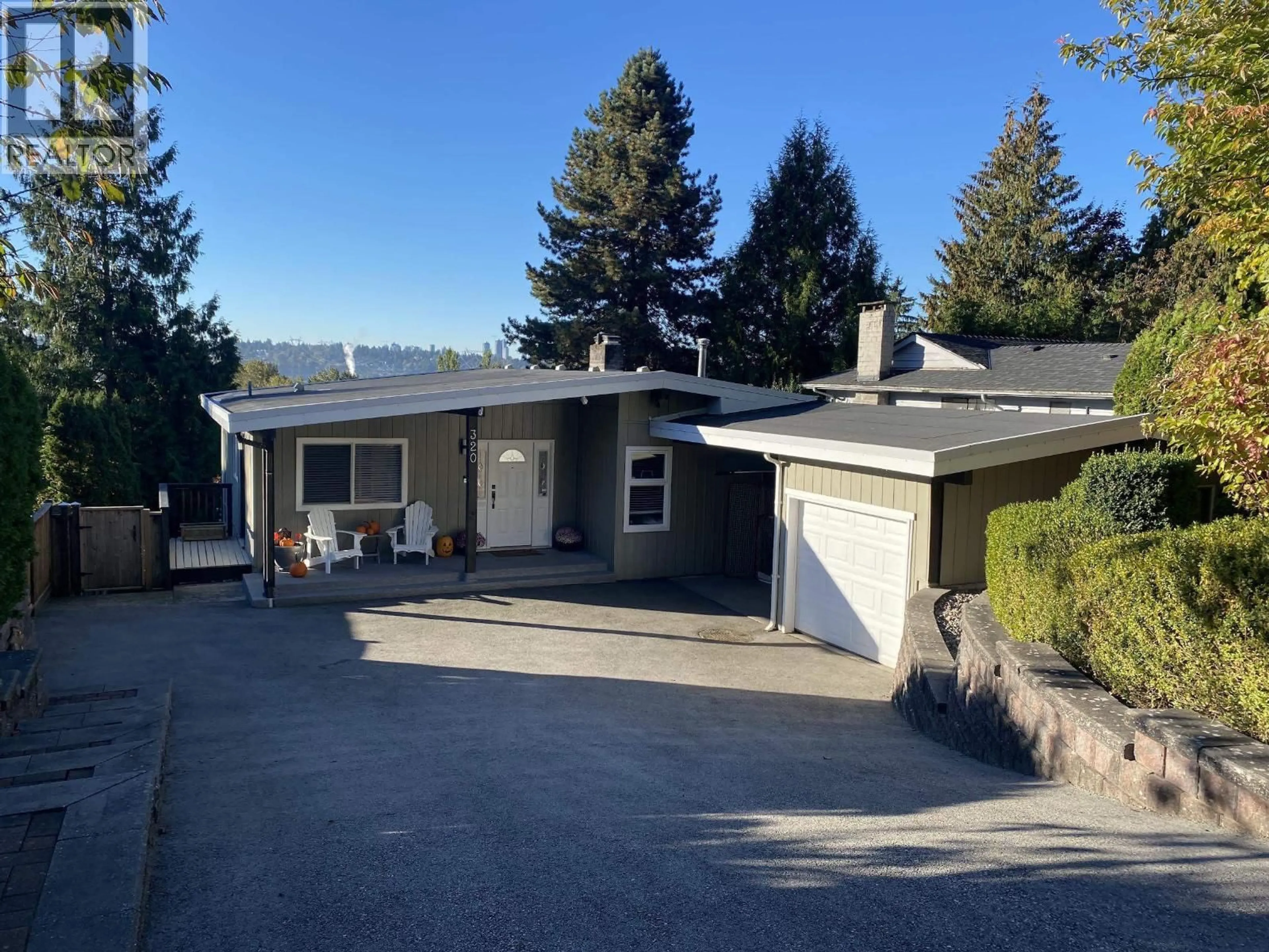 Home with vinyl exterior material, street for 320 DARTMOOR DRIVE, Coquitlam British Columbia V3K5R3