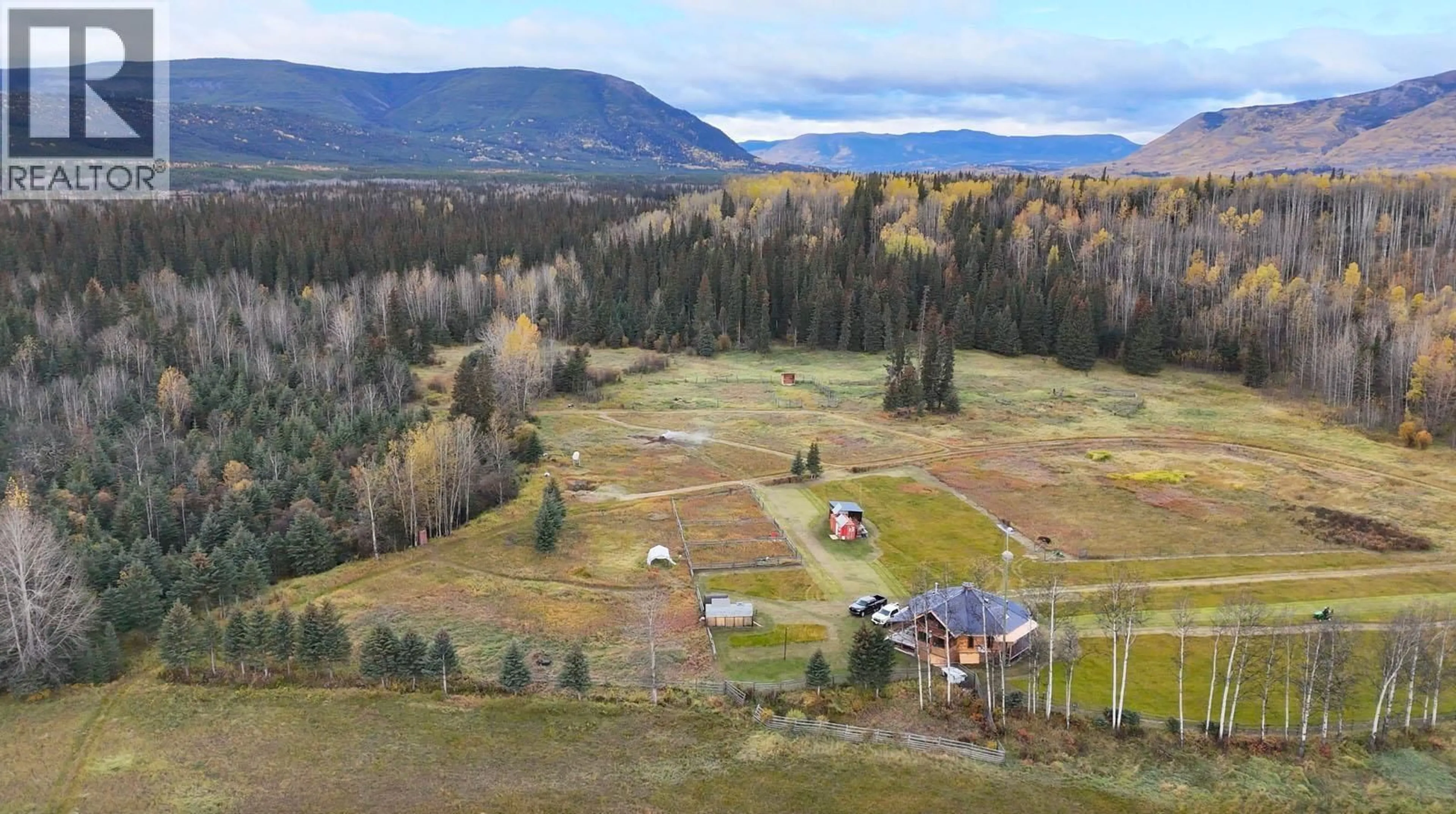 A pic from outside/outdoor area/front of a property/back of a property/a pic from drone, mountain view for 26747 PINK MOUNTAIN ROAD, Fort St. John British Columbia V0C2B0