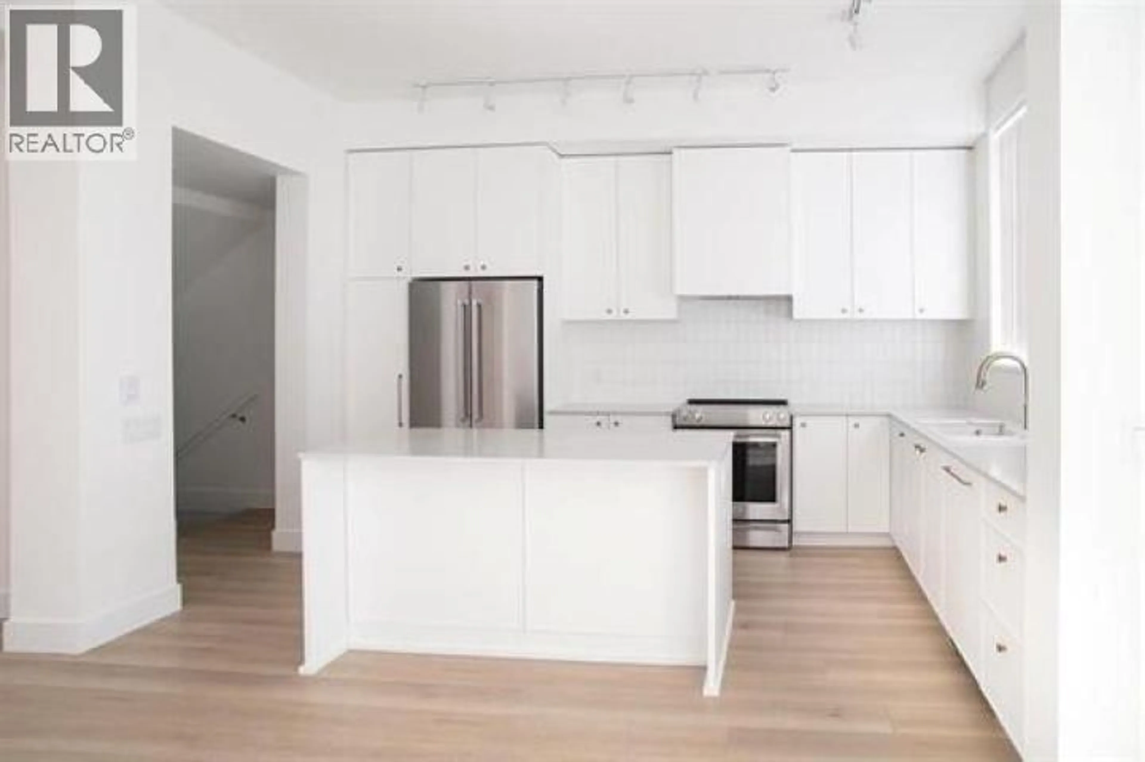 Open concept kitchen, wood/laminate floor for 189 - 1331 OLMSTED STREET, Coquitlam British Columbia V3E0T3