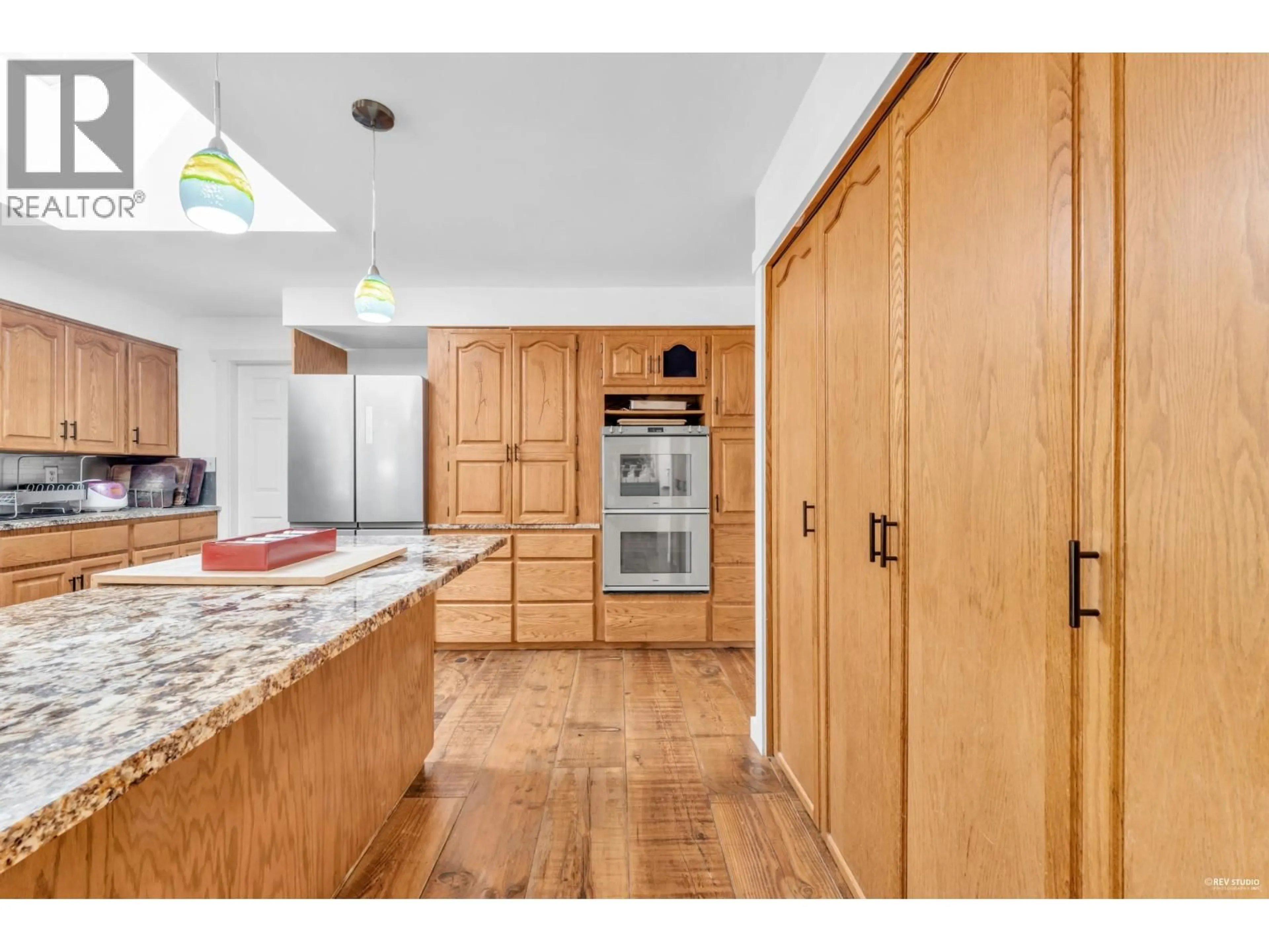 Open concept kitchen, wood/laminate floor for 12643 GARIBALDI STREET, Maple Ridge British Columbia V2W1N5