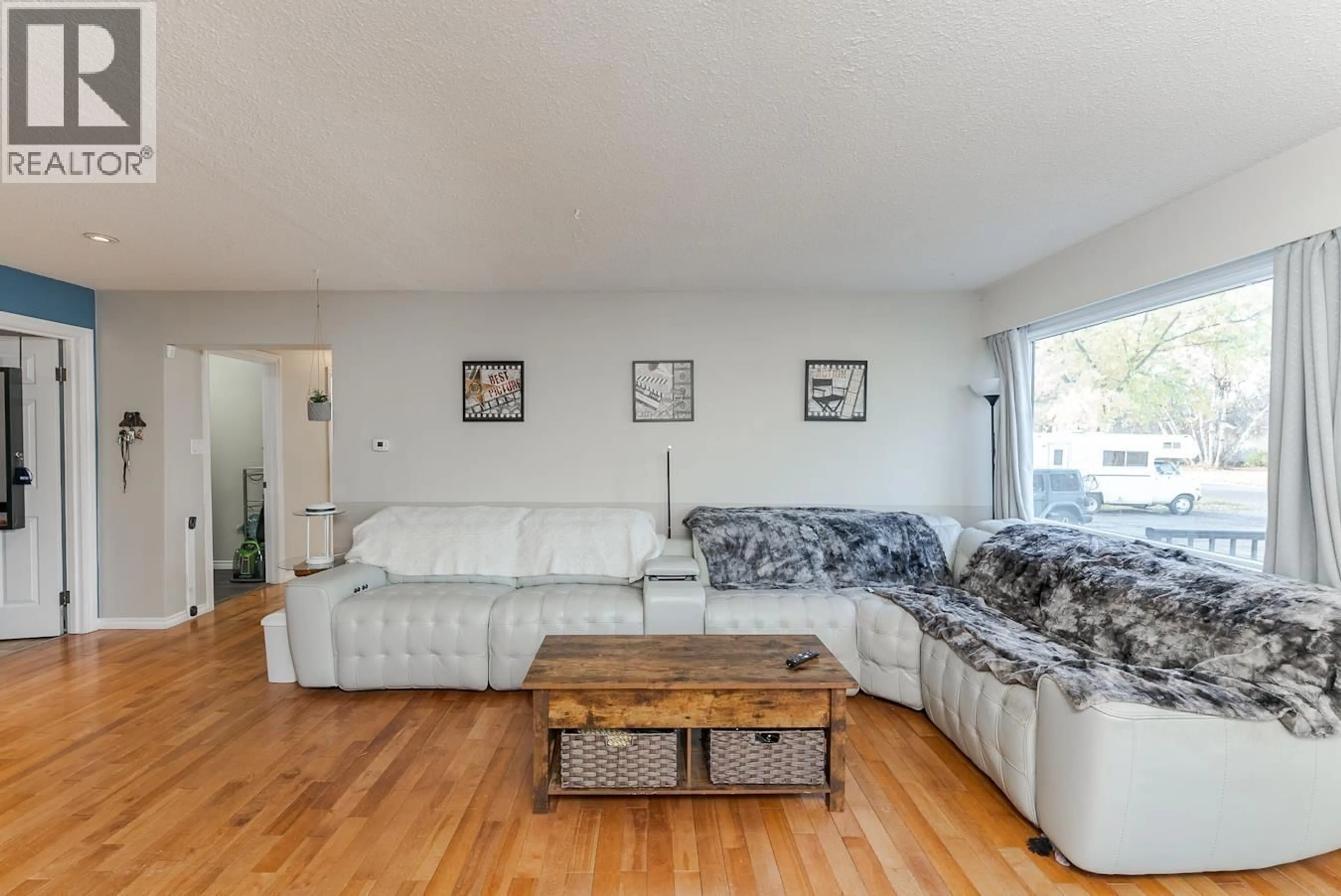 Living room with furniture, wood/laminate floor for 1768 LARCH STREET, Prince George British Columbia V2L1V3