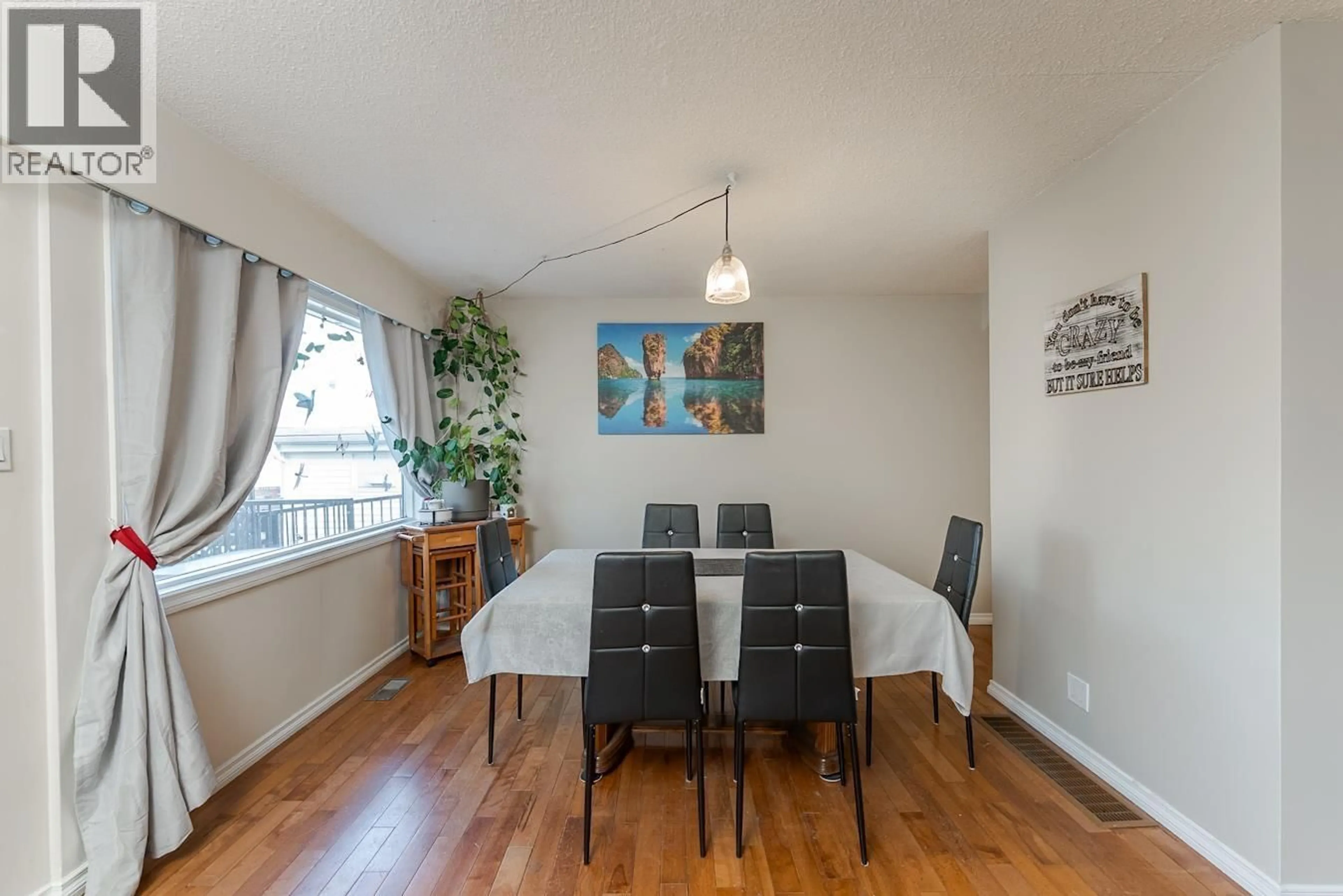 Dining room, wood/laminate floor for 1768 LARCH STREET, Prince George British Columbia V2L1V3