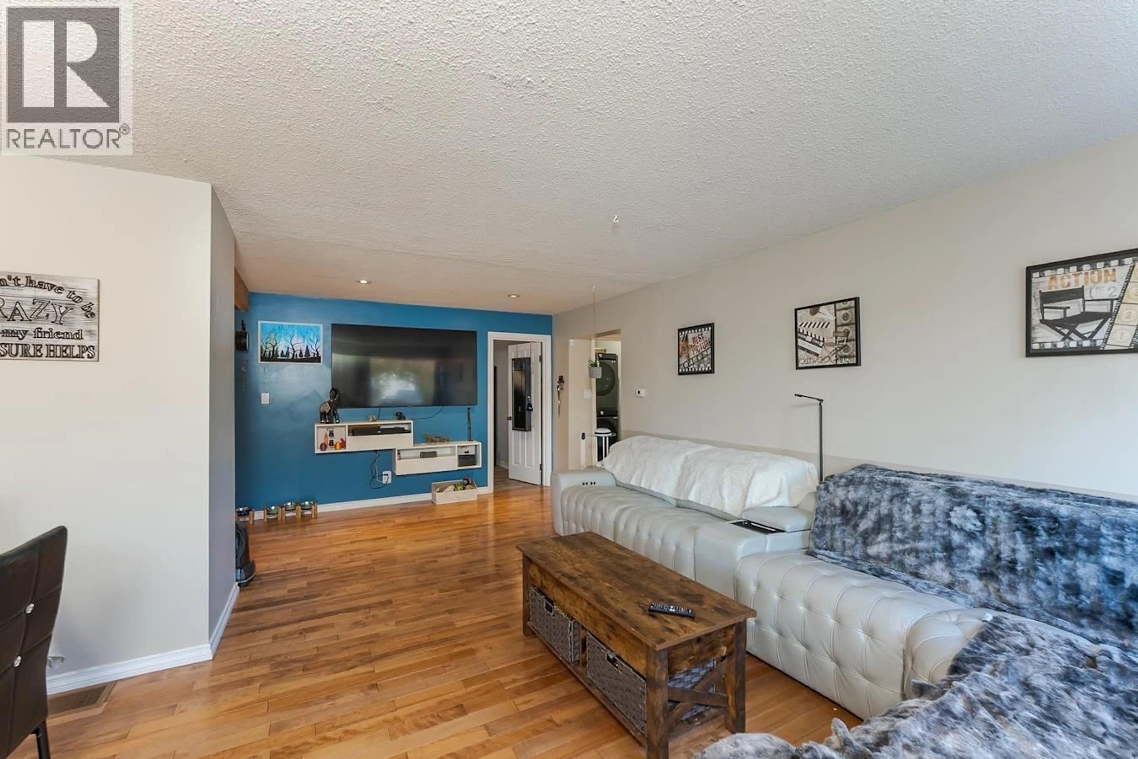 Living room with furniture, wood/laminate floor for 1768 LARCH STREET, Prince George British Columbia V2L1V3
