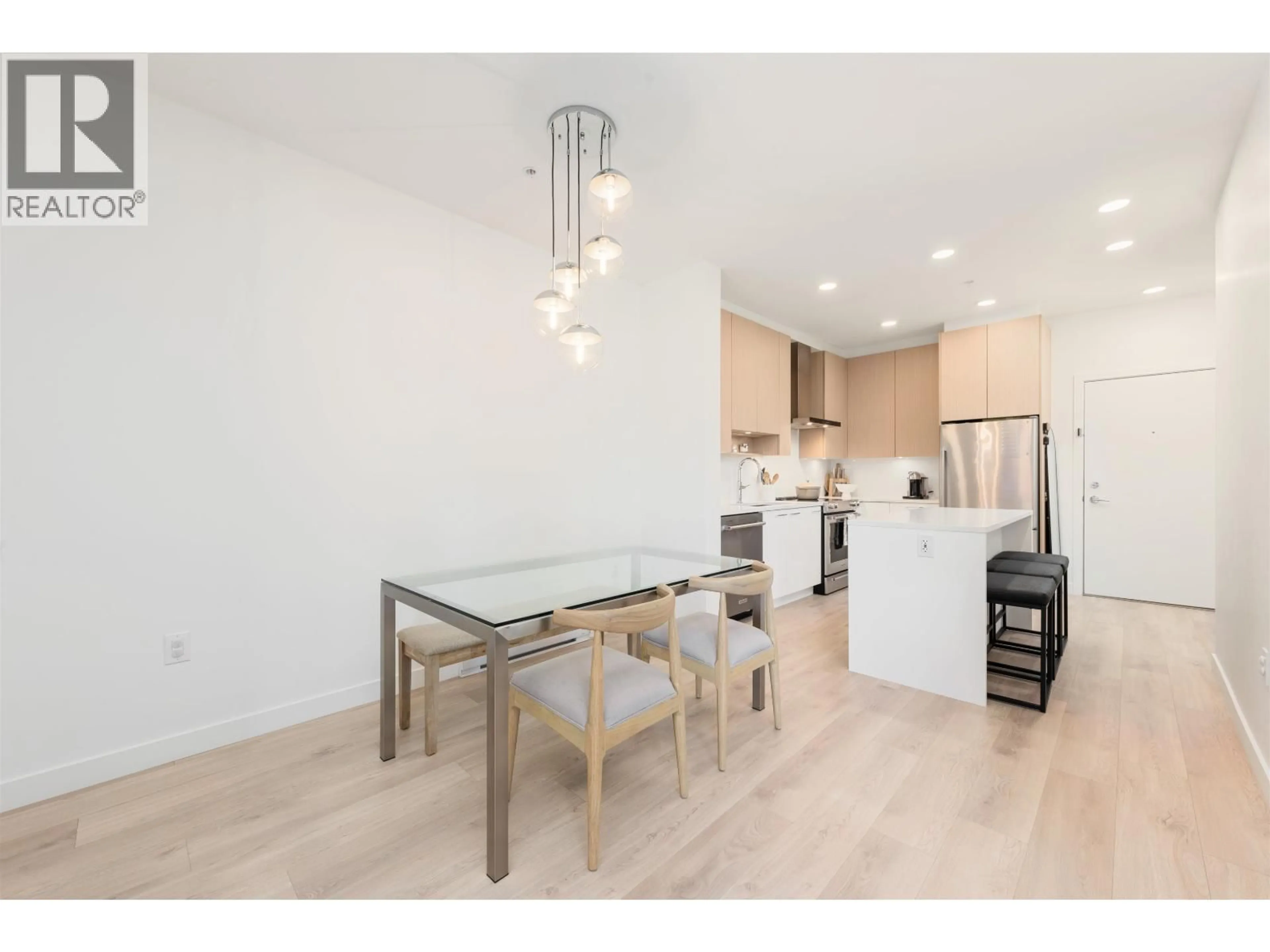 Open concept kitchen, wood/laminate floor for 222 - 7588 16TH STREET, Burnaby British Columbia V3N0H8