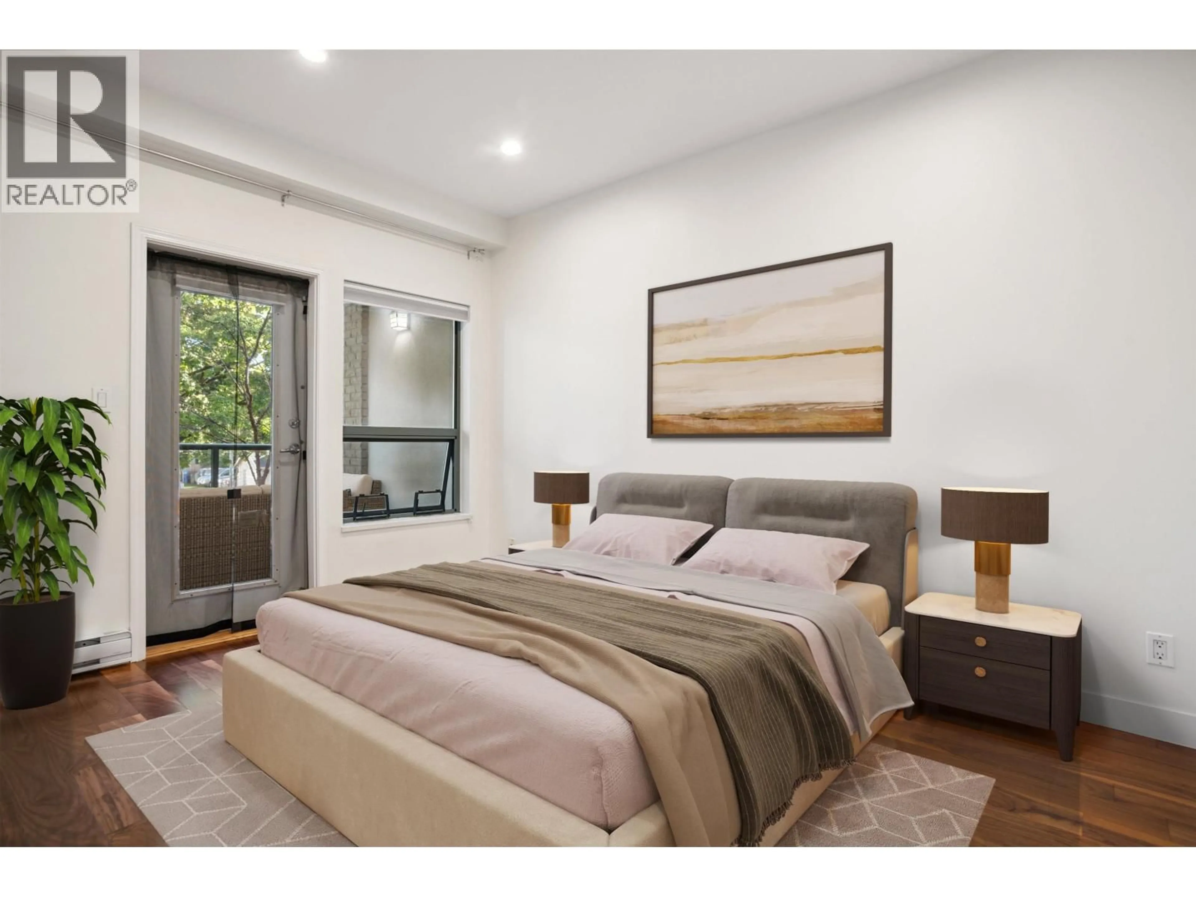 Bedroom with bed, wood/laminate floor for 210 - 2028 W 11TH AVENUE, Vancouver British Columbia V6J2C9