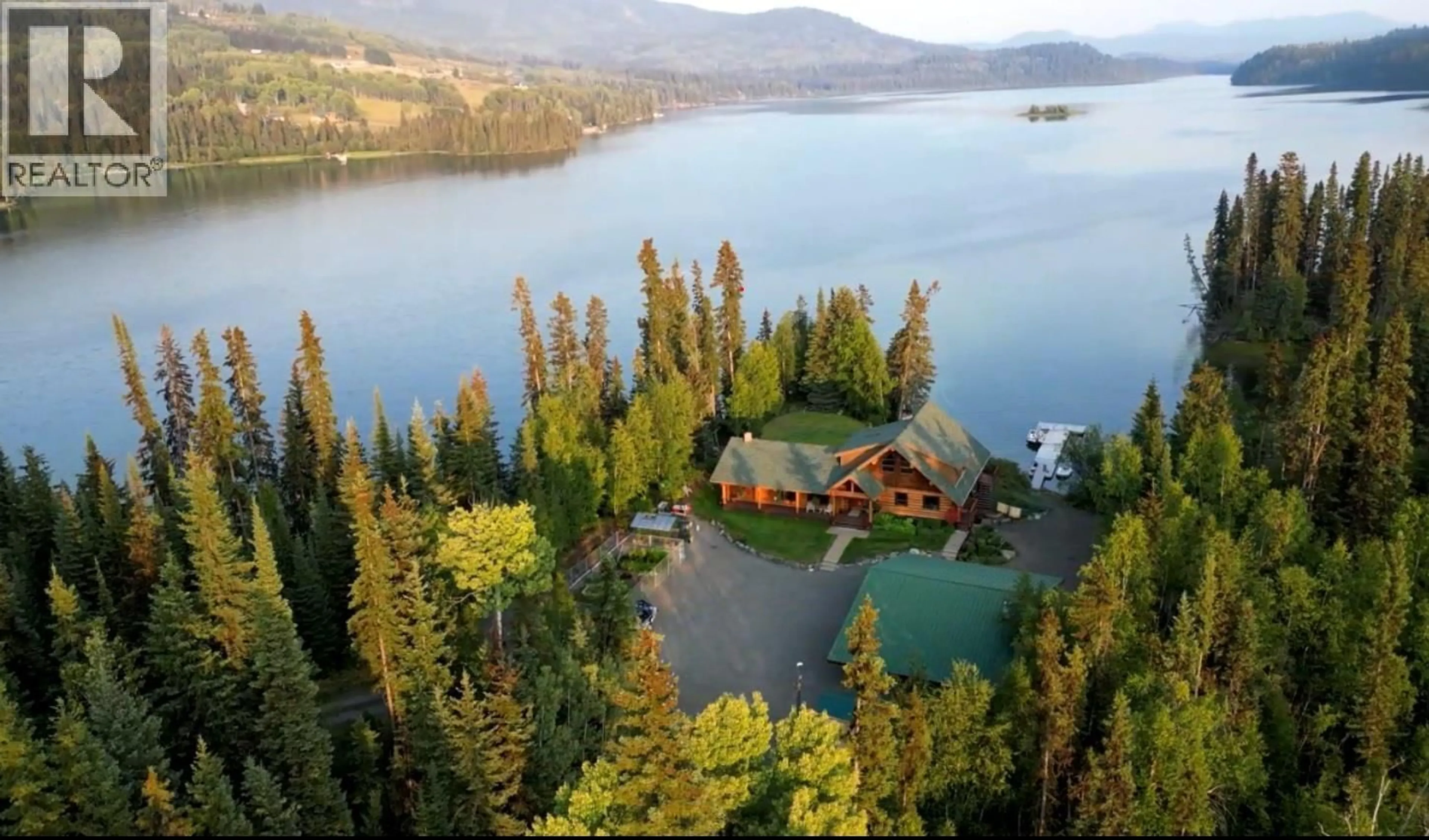 A pic from outside/outdoor area/front of a property/back of a property/a pic from drone, water/lake/river/ocean view for 8528 HIGHWAY 24 HIGHWAY, Bridge Lake British Columbia V0K1E0