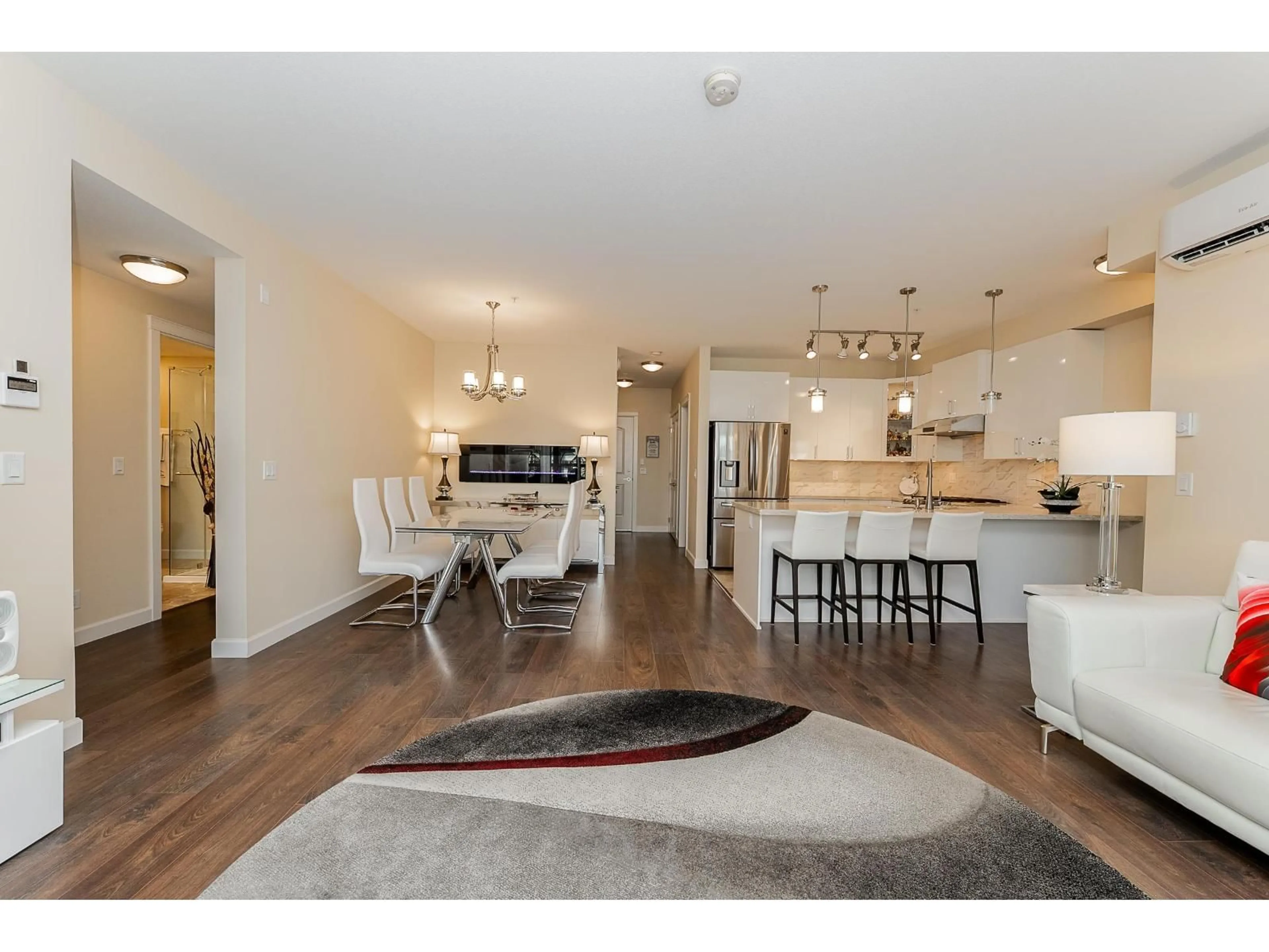 Open concept kitchen, wood/laminate floor for 506 - 8558 202B, Langley British Columbia V2Y3L4
