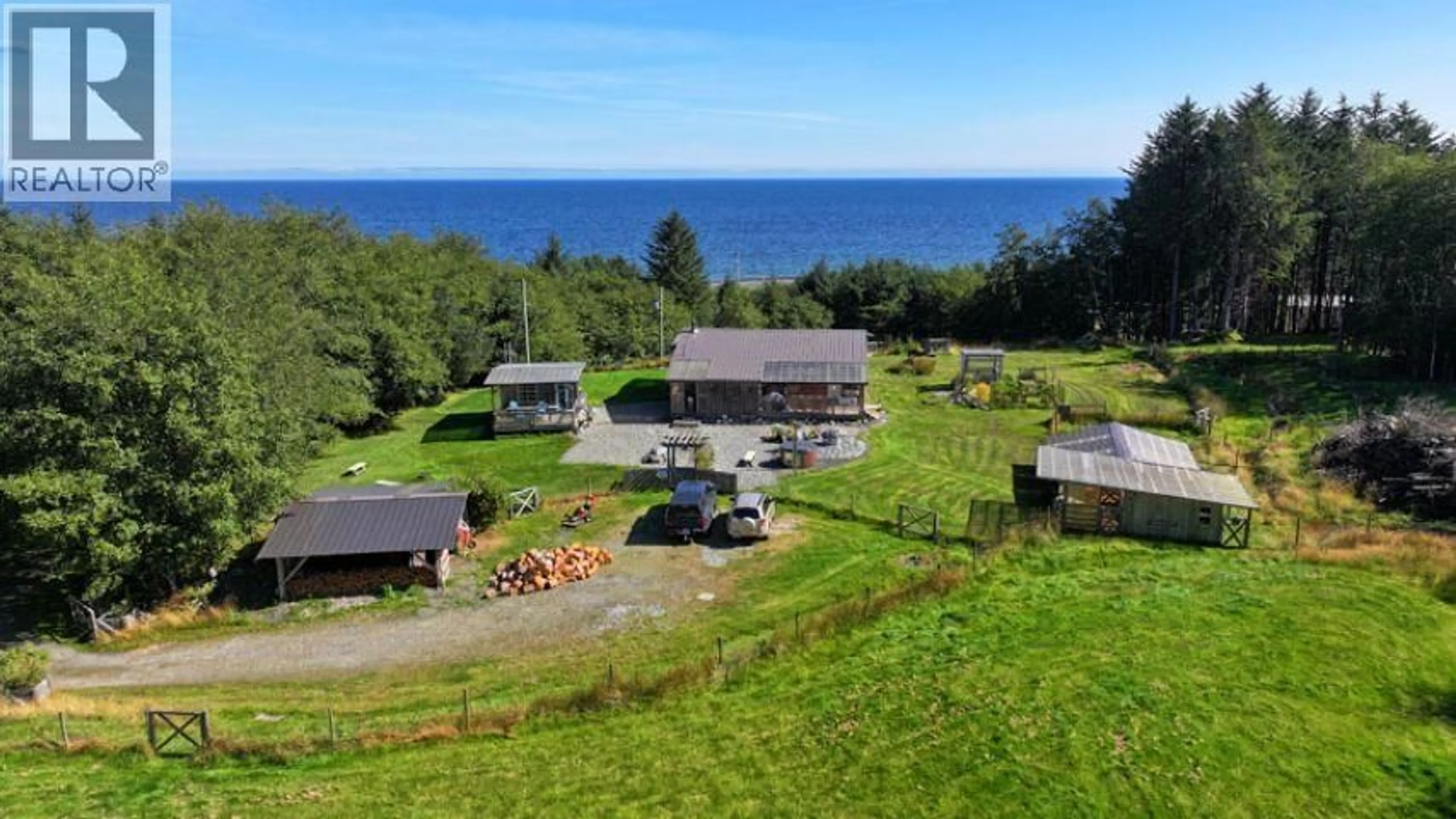 A pic from outside/outdoor area/front of a property/back of a property/a pic from drone, water/lake/river/ocean view for 31790 16 HIGHWAY, Daajing Giids City British Columbia V0T1Y0