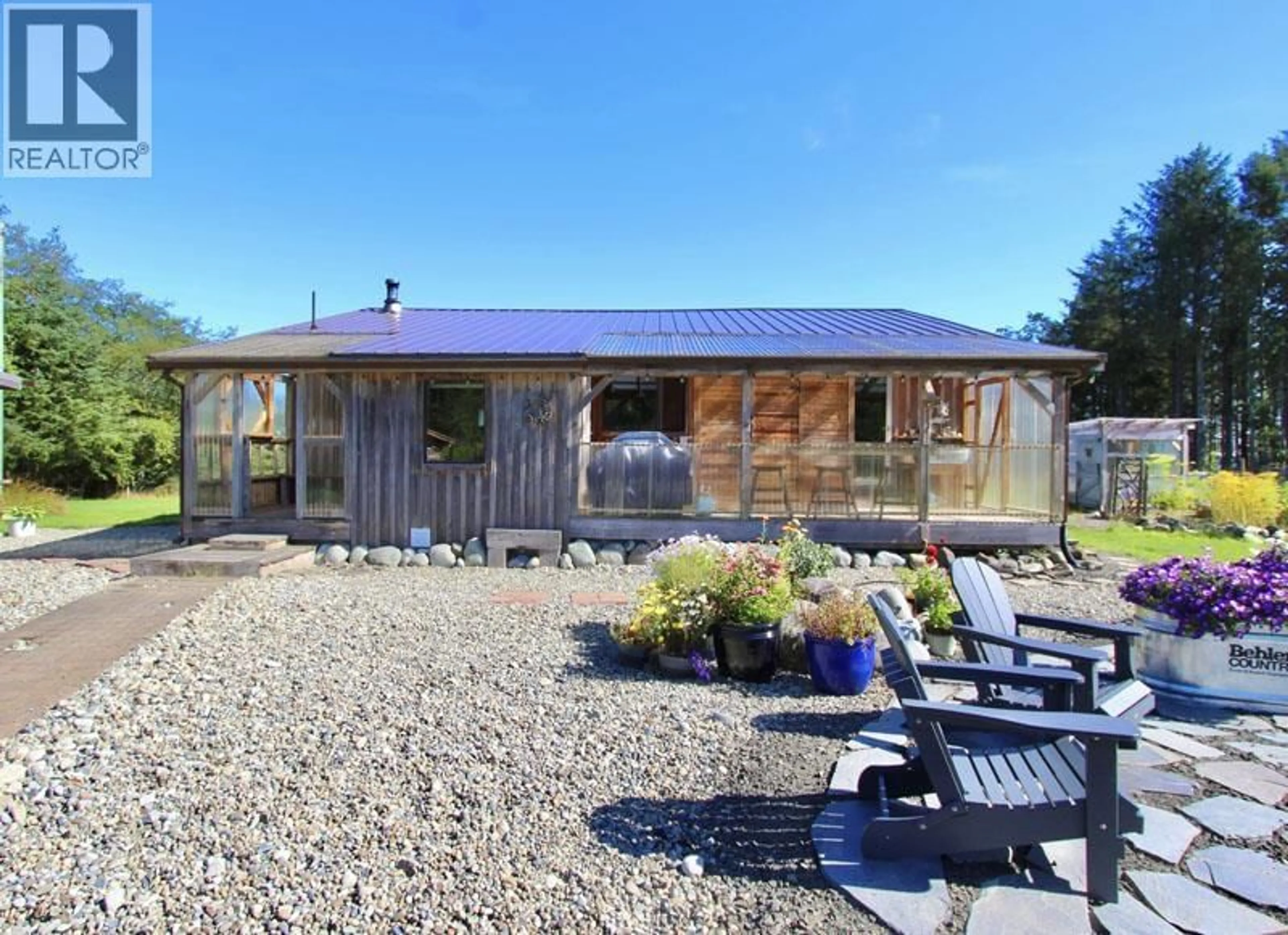 A pic from outside/outdoor area/front of a property/back of a property/a pic from drone, unknown for 31790 16 HIGHWAY, Daajing Giids City British Columbia V0T1Y0