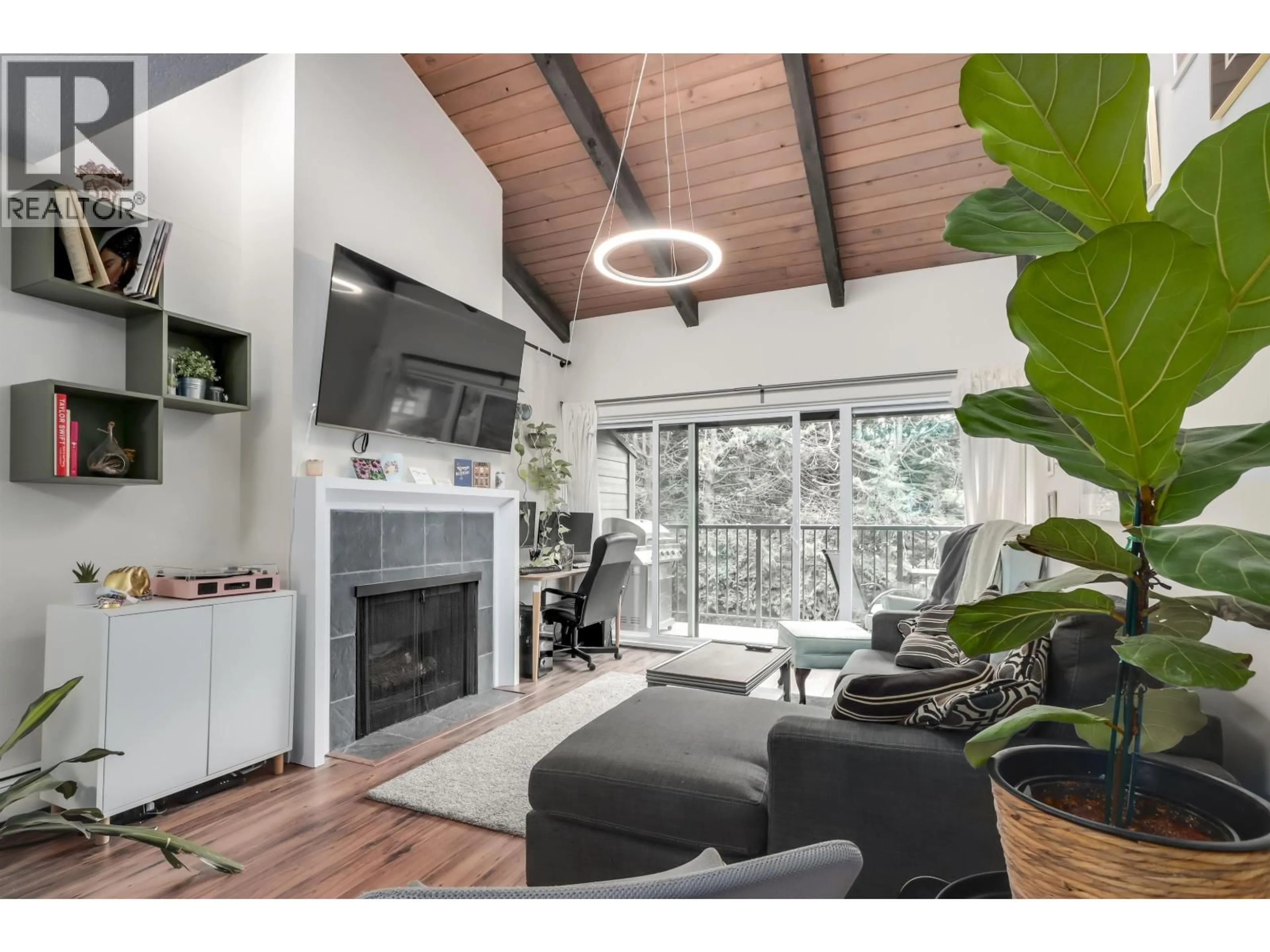 Living room with furniture, wood/laminate floor for 301 - 330 7TH AVENUE, Vancouver British Columbia V5T4K5