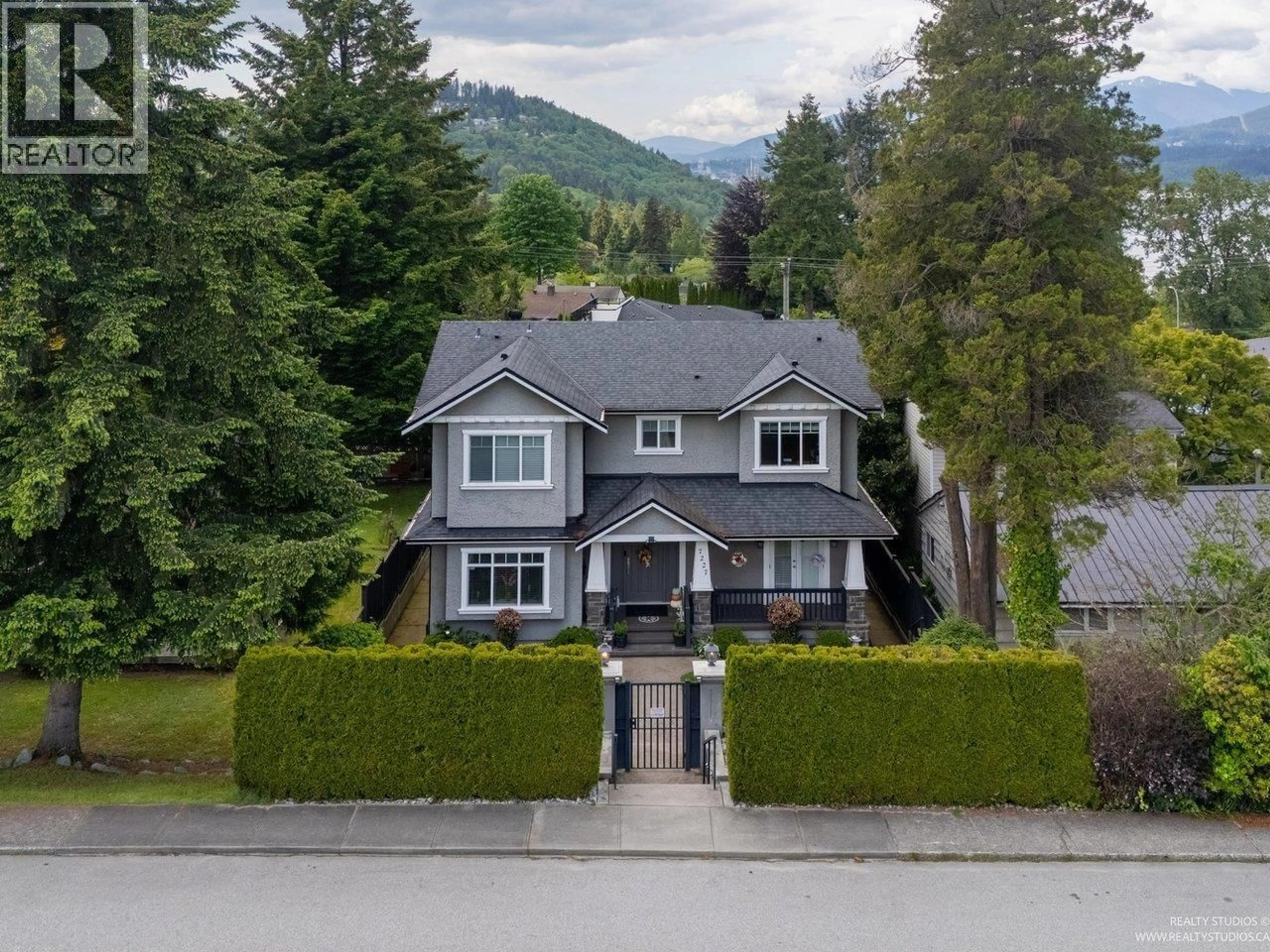 A pic from outside/outdoor area/front of a property/back of a property/a pic from drone, mountain view for 7227 BARNET ROAD, Burnaby British Columbia V5A1E3