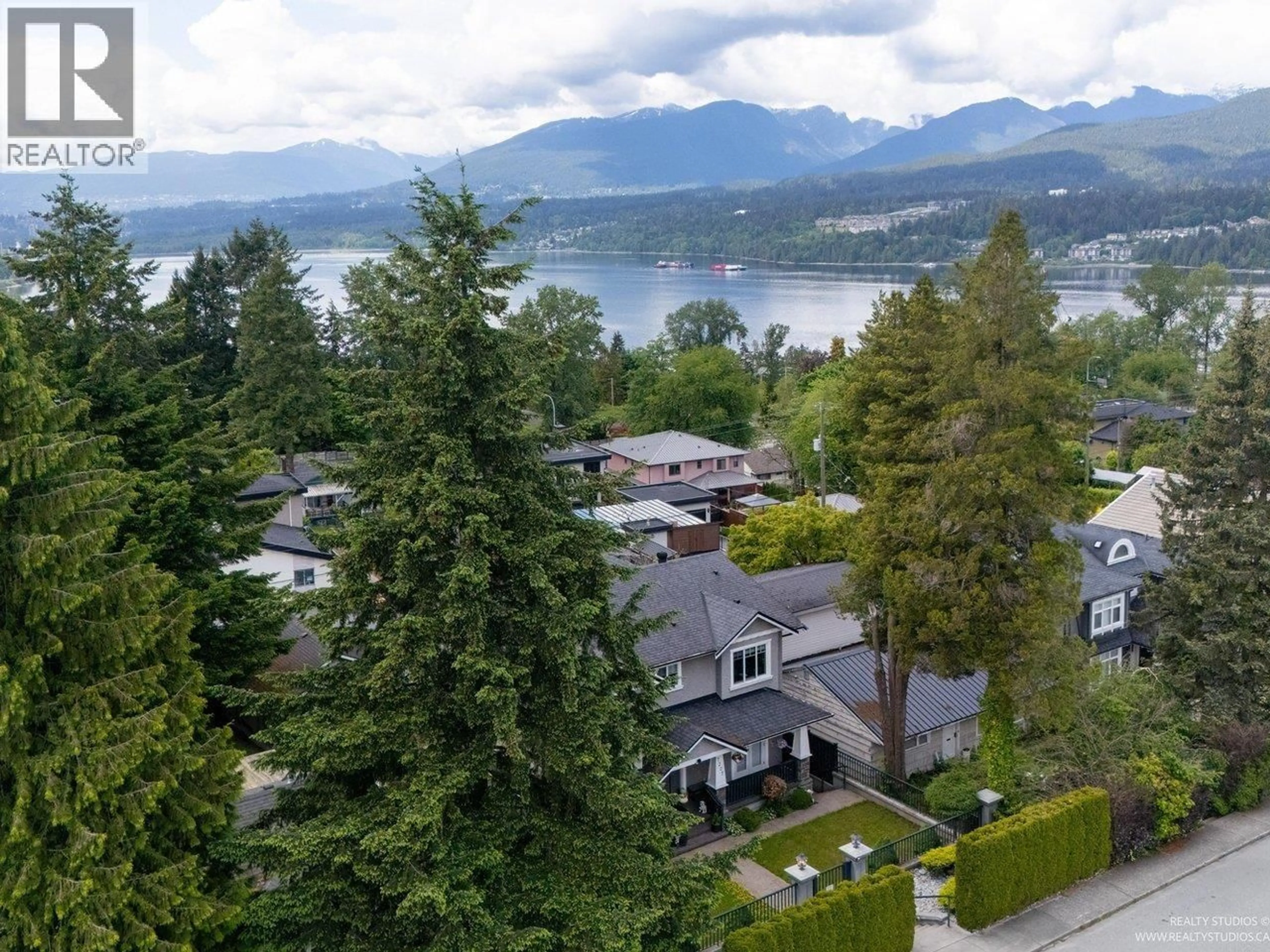 A pic from outside/outdoor area/front of a property/back of a property/a pic from drone, mountain view for 7227 BARNET ROAD, Burnaby British Columbia V5A1E3