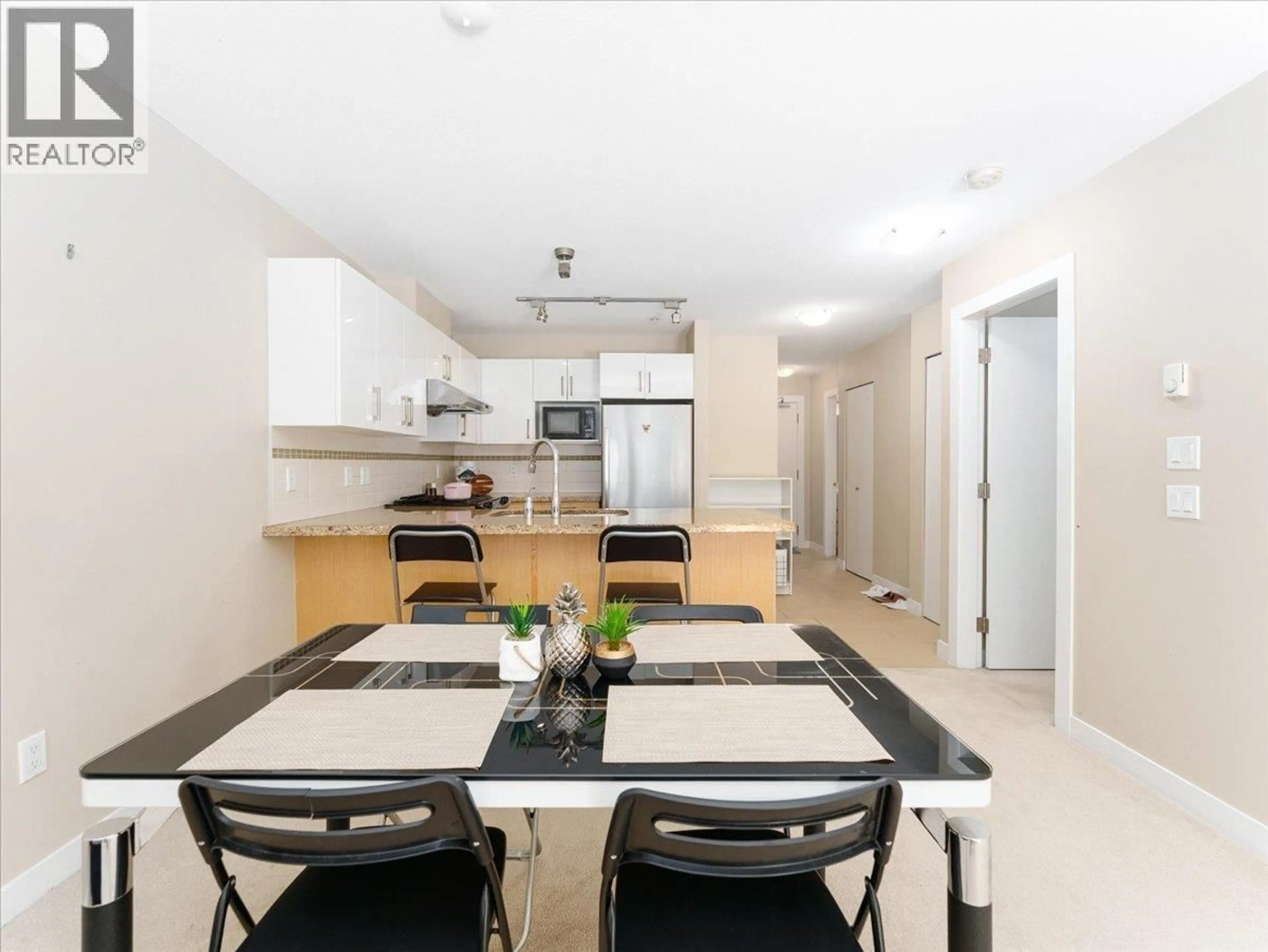 Open concept kitchen, unknown for 101 - 6800 ECKERSLEY ROAD, Richmond British Columbia V6Y0E7