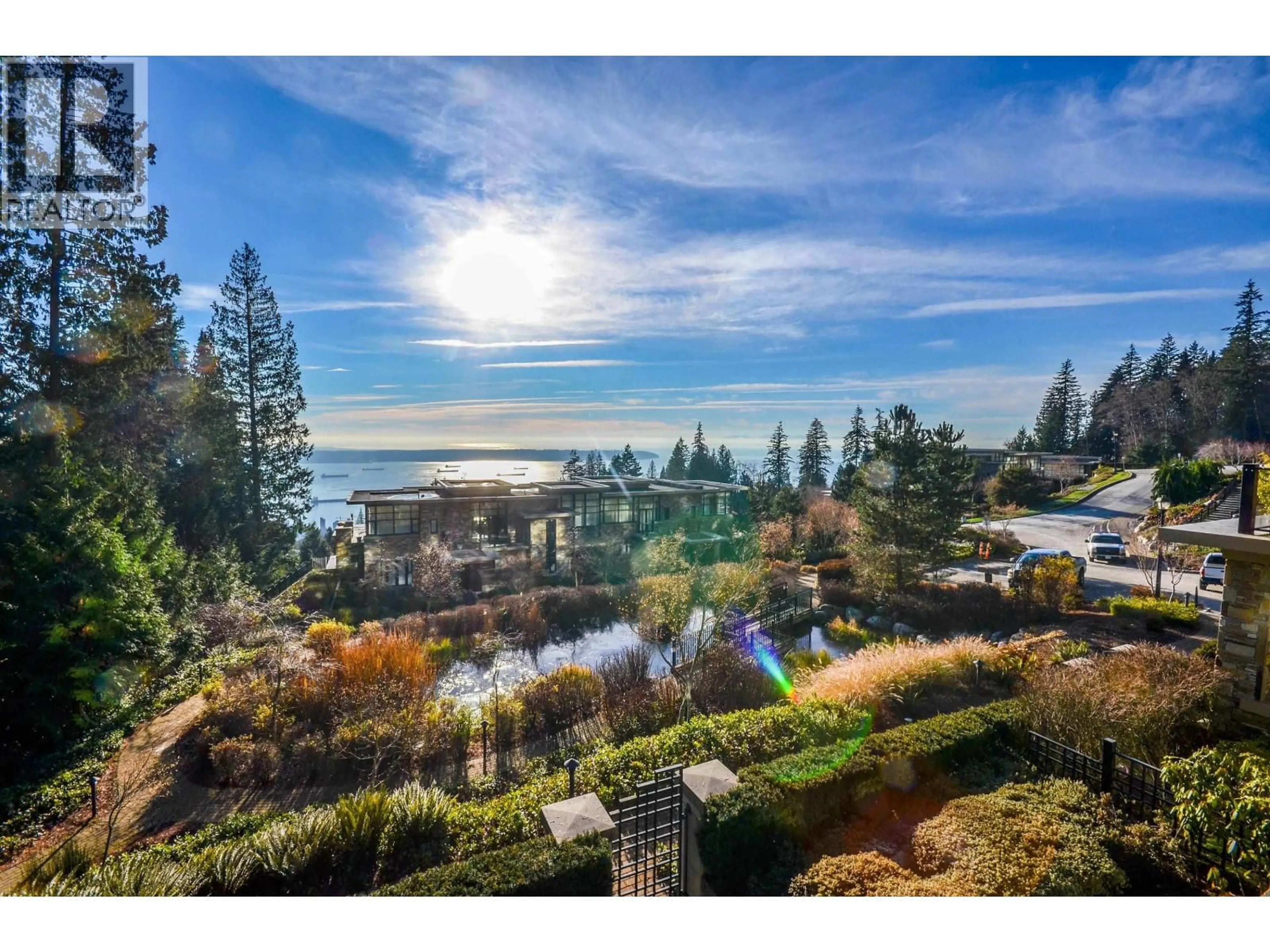 A pic from outside/outdoor area/front of a property/back of a property/a pic from drone, water/lake/river/ocean view for 103 - 2235 TWIN CREEK PLACE, West Vancouver British Columbia V7S3K4