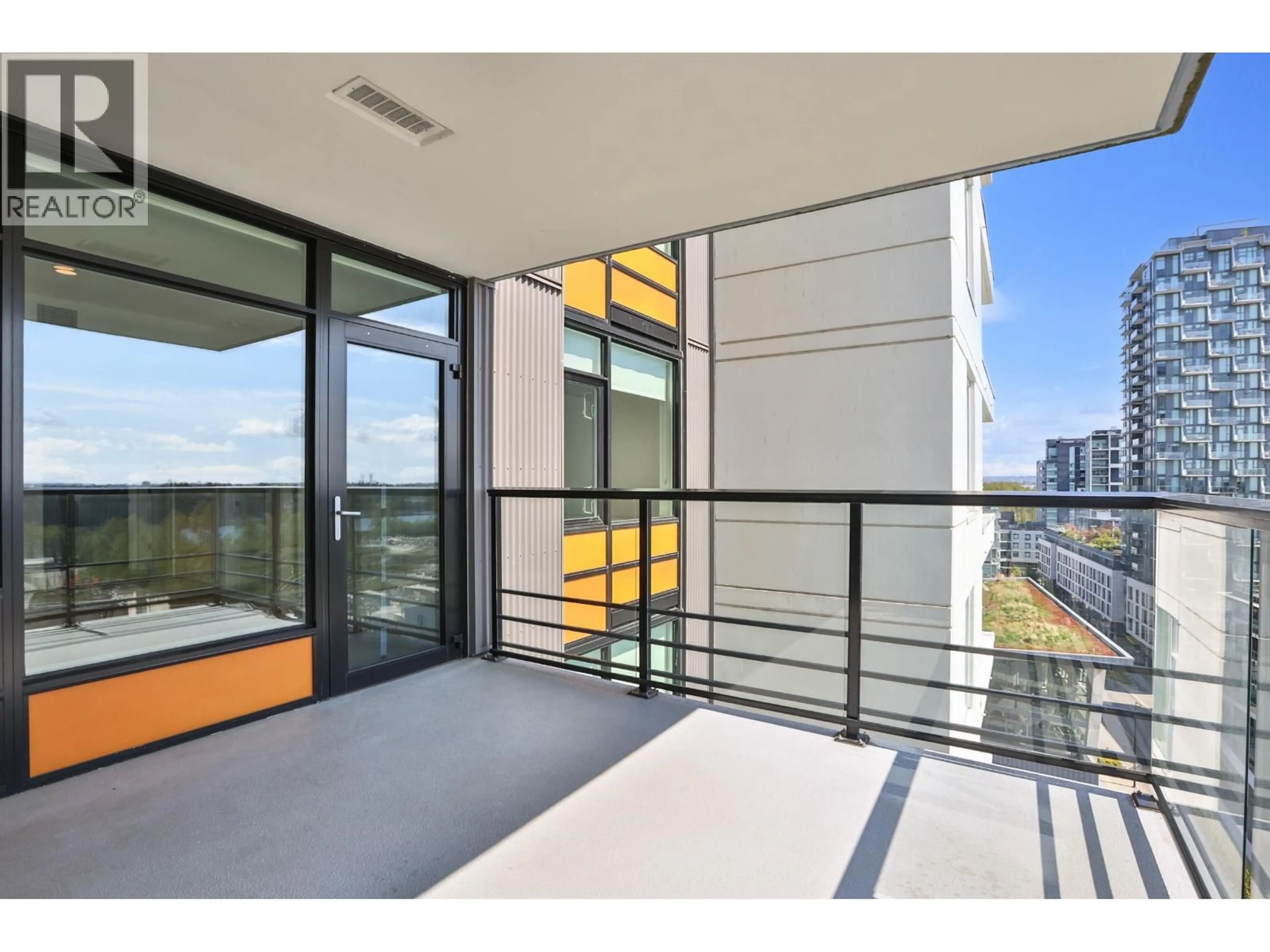 Balcony in the apartment, city buildings view from balcony for 1104 - 8533 RIVER DISTRICT CROSSING, Vancouver British Columbia V5S0H2