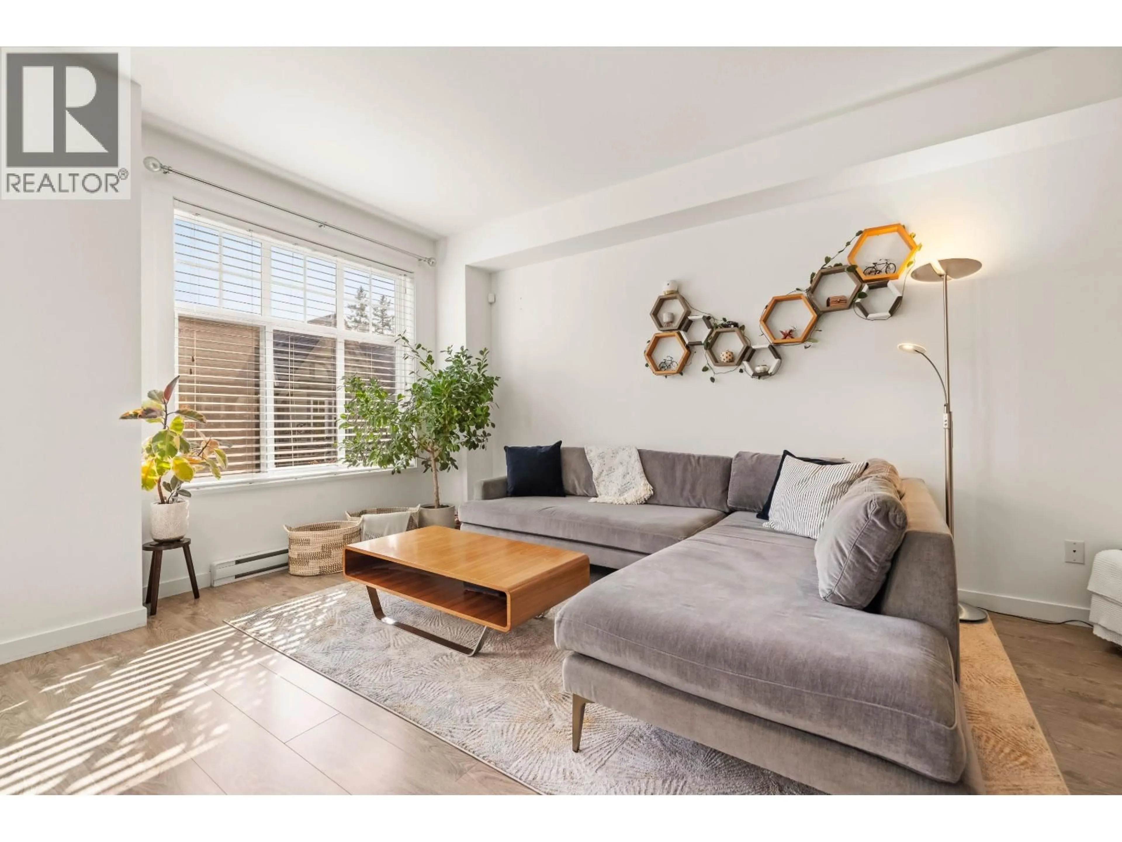 Living room with furniture, wood/laminate floor for 33 - 1320 RILEY STREET, Coquitlam British Columbia V3E0J4