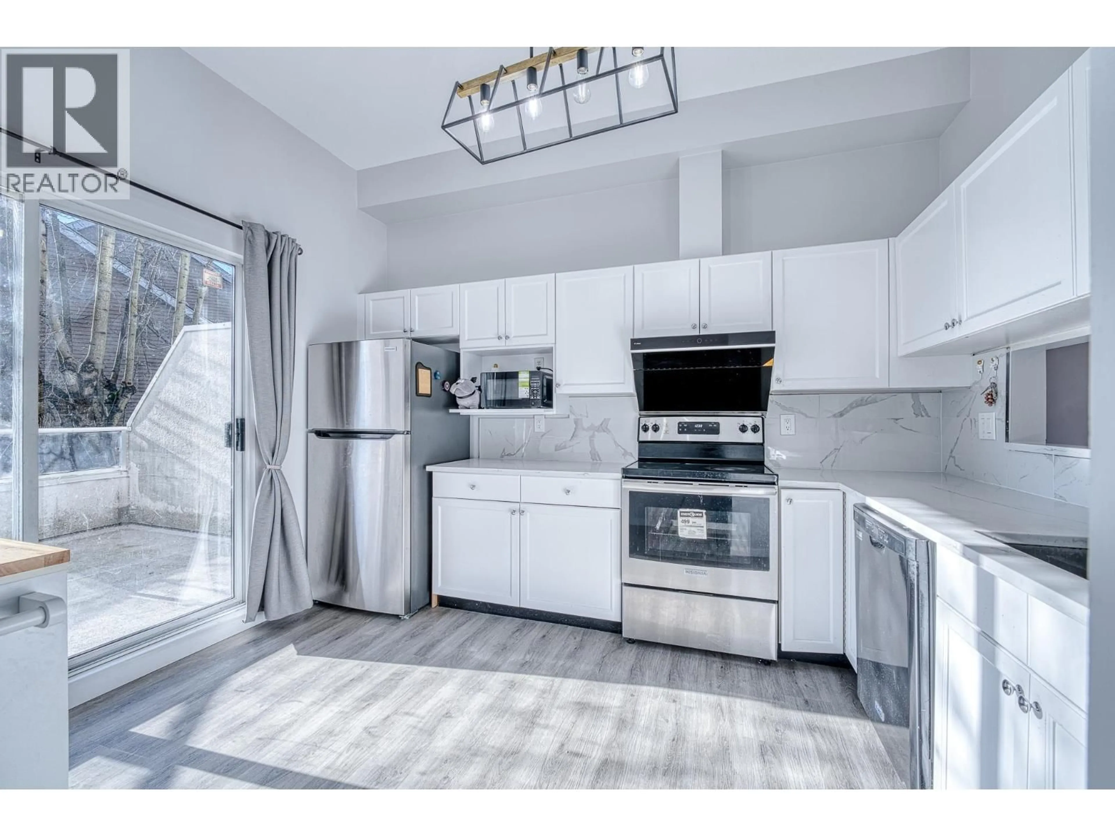Open concept kitchen, ceramic/tile floor for 19 - 7380 MINORU BOULEVARD, Richmond British Columbia V6Y1Z5