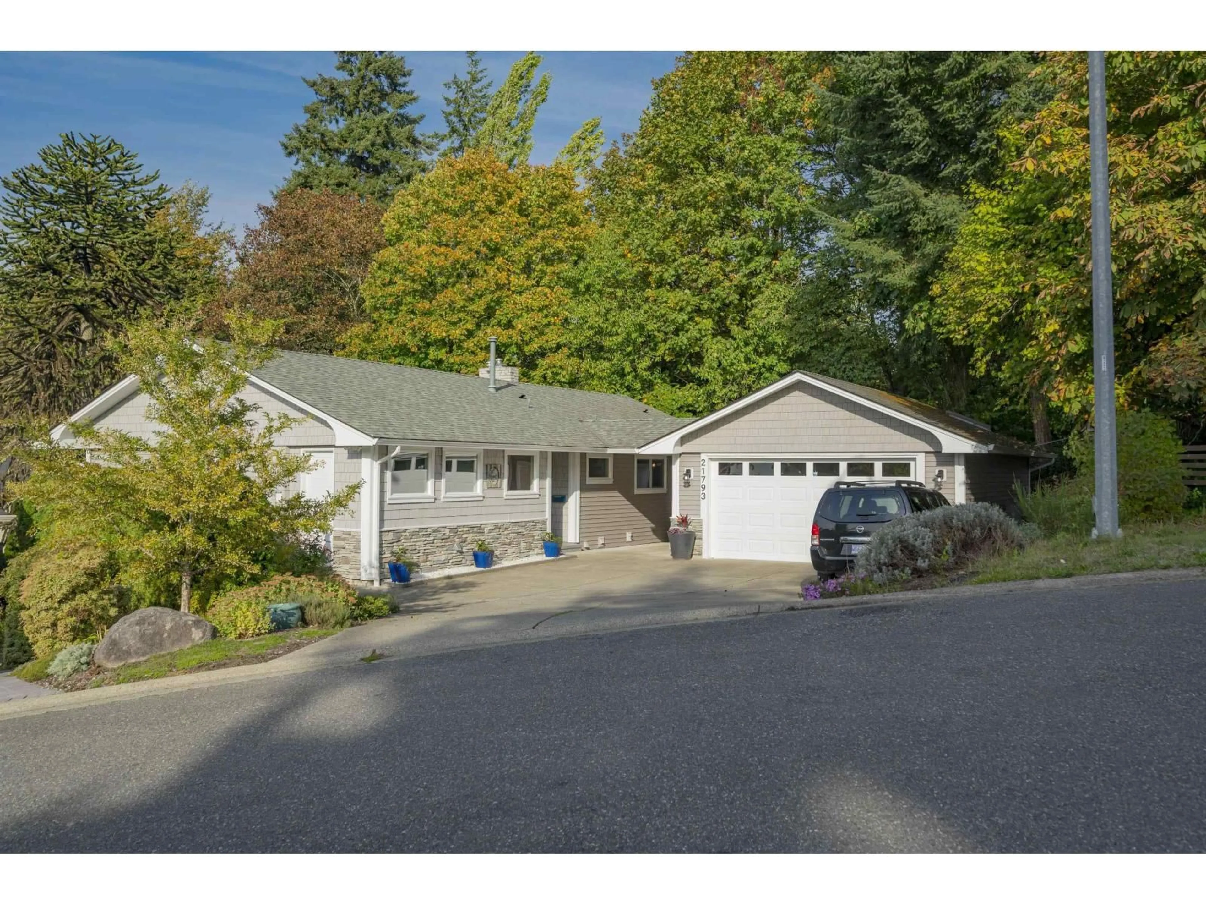 Home with vinyl exterior material, street for 21793 48A, Langley British Columbia V3A3P7